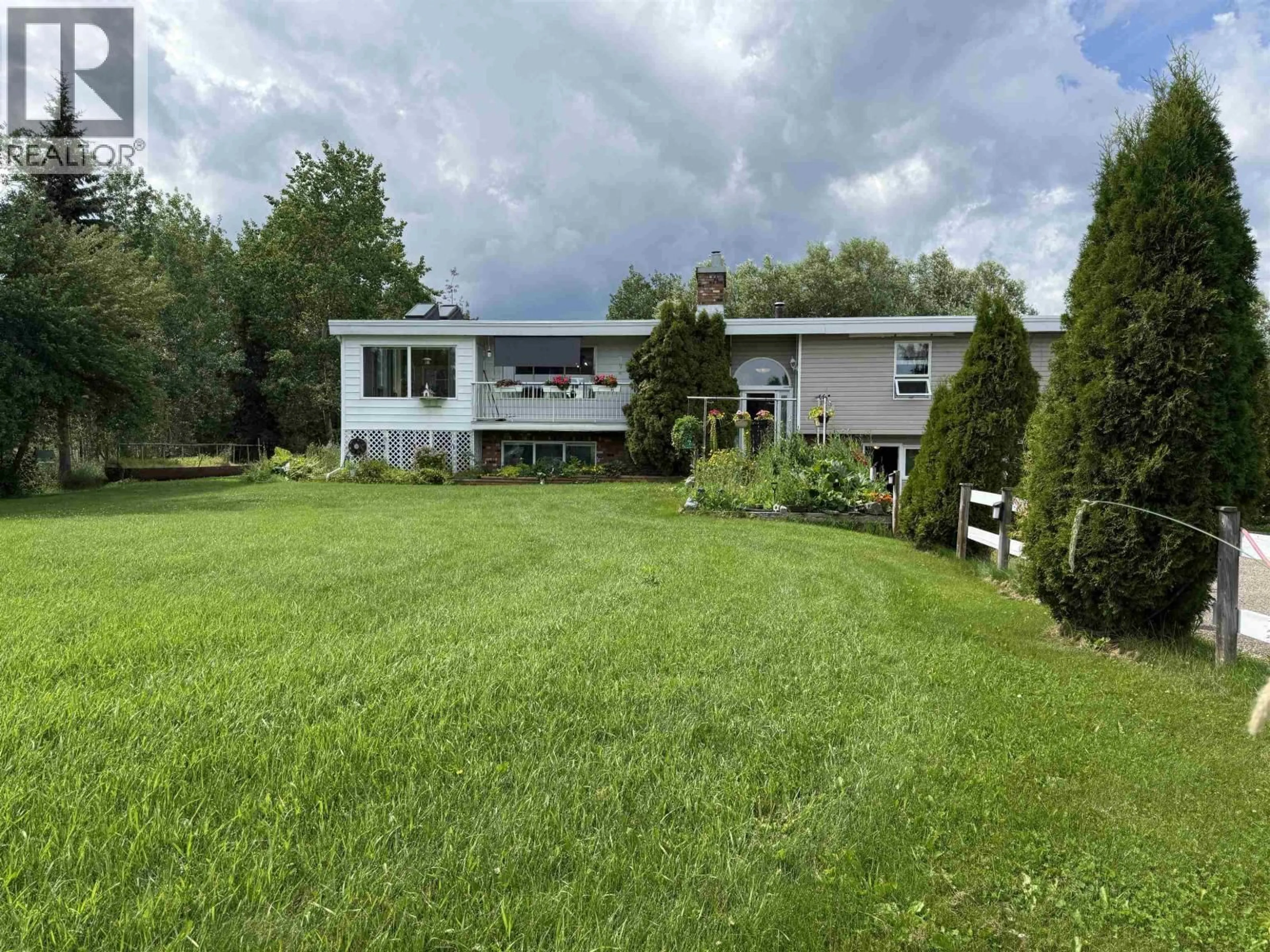 A pic from outside/outdoor area/front of a property/back of a property/a pic from drone, unknown for 16795 HART HIGHWAY, Salmon Valley British Columbia V2K5X5