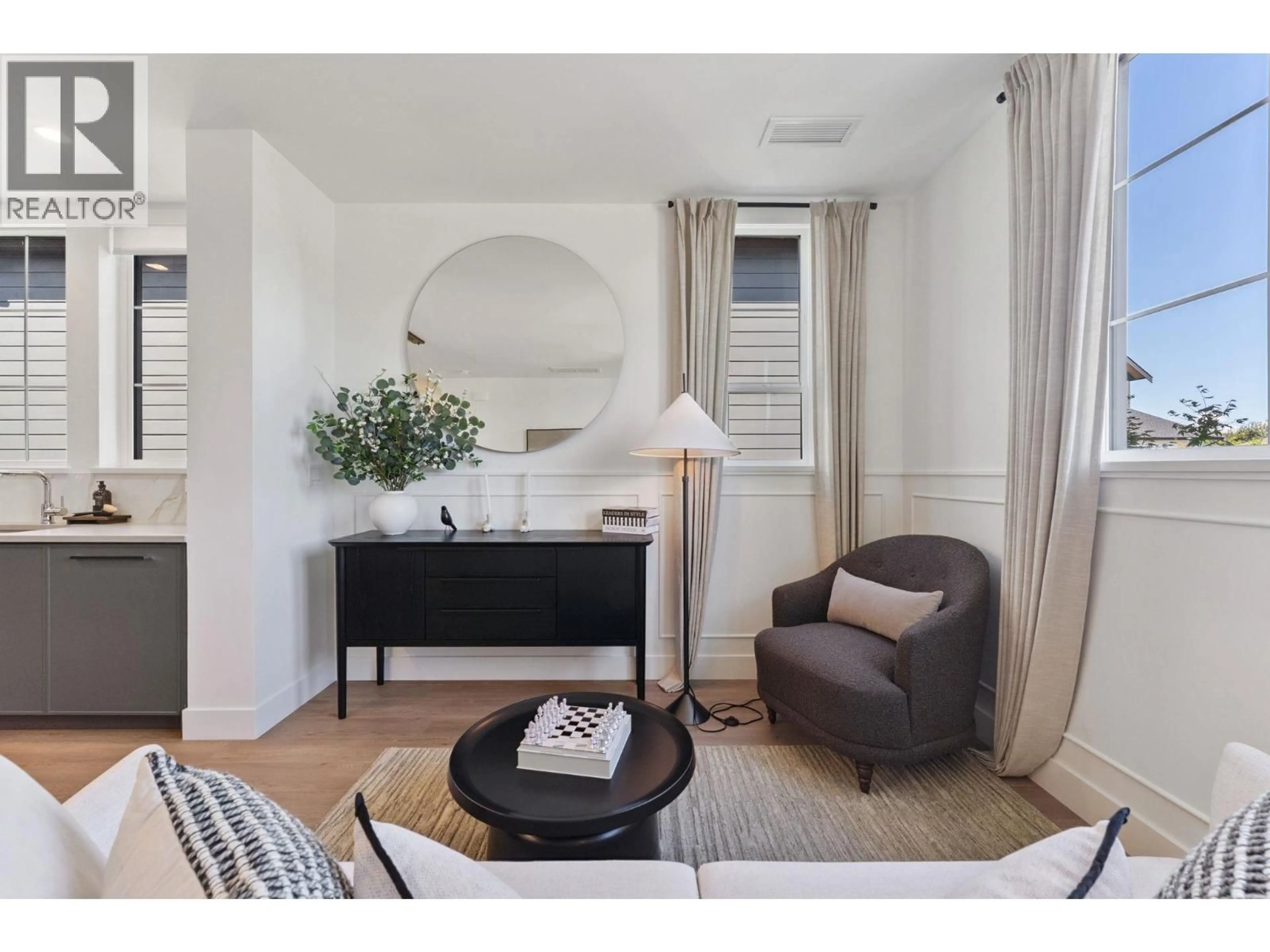 Living room with furniture, wood/laminate floor for 21 - 10188 NO. 1 ROAD, Richmond British Columbia V7E0C8