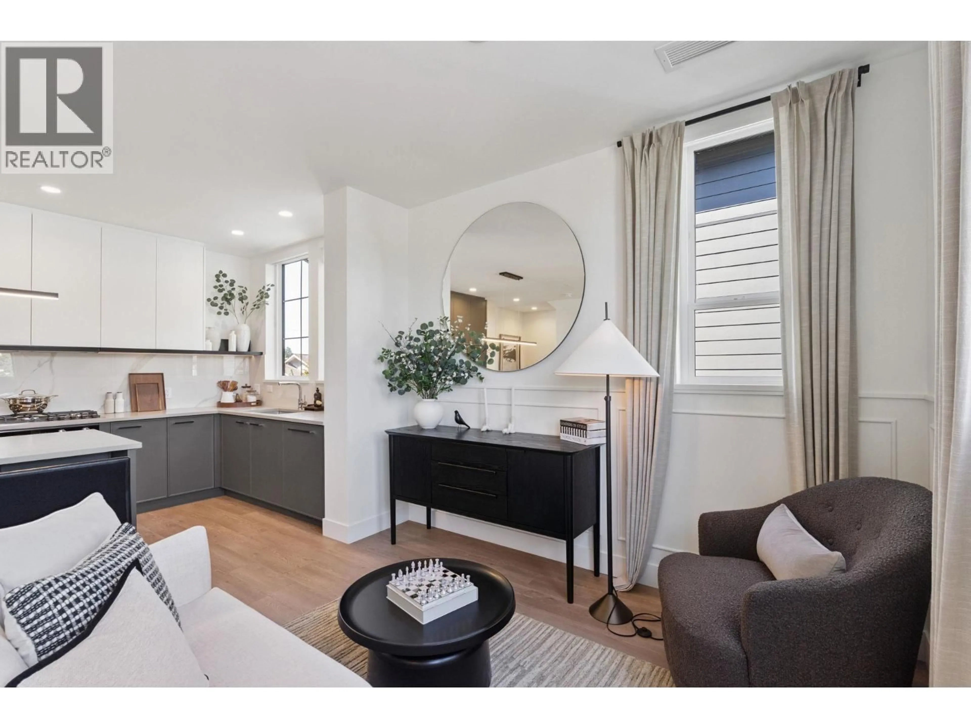 Living room with furniture, wood/laminate floor for 21 - 10188 NO. 1 ROAD, Richmond British Columbia V7E0C8