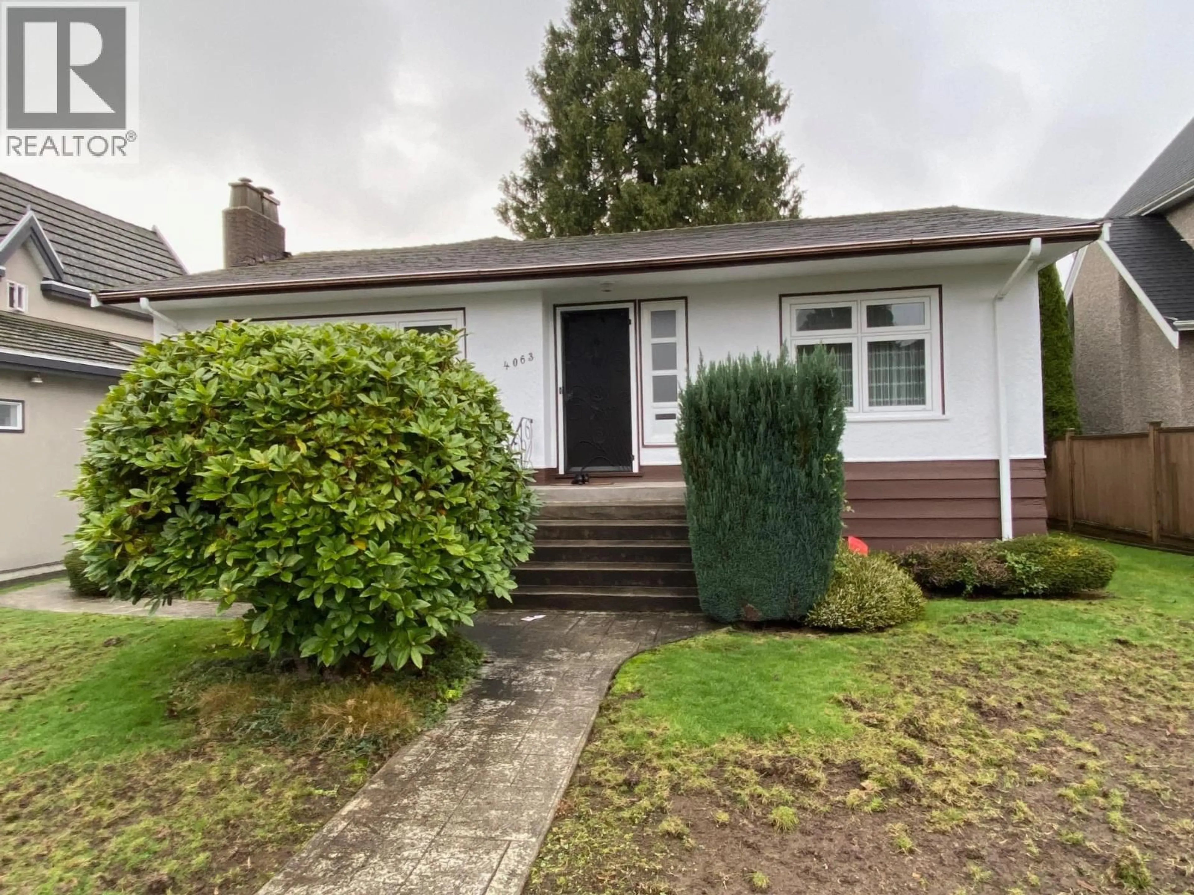 A pic from outside/outdoor area/front of a property/back of a property/a pic from drone, street for 4063 W 40TH AVENUE, Vancouver British Columbia V6N3B9