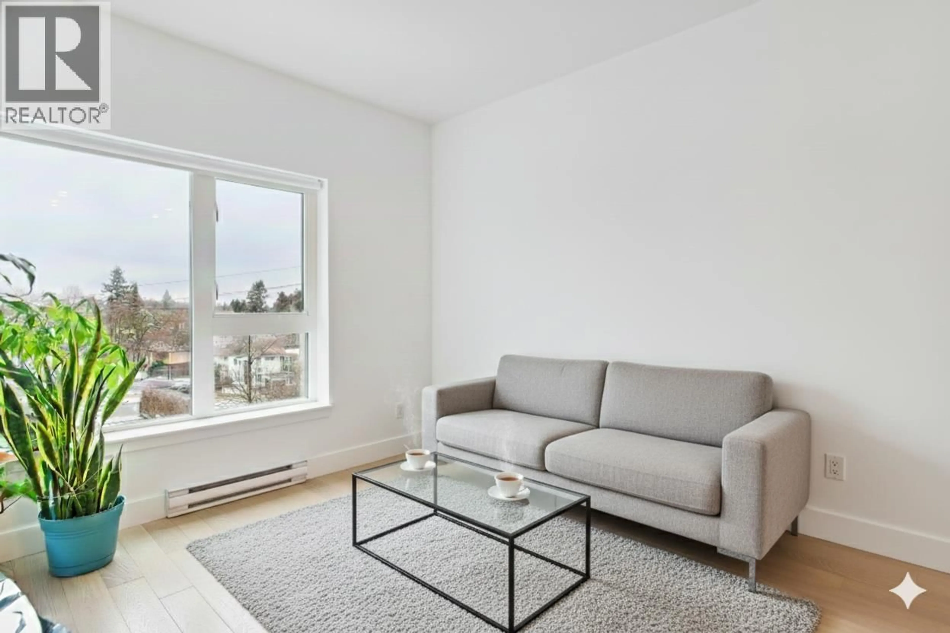 Living room with furniture, unknown for 407 - 2666 DUKE STREET, Vancouver British Columbia V5R4S9