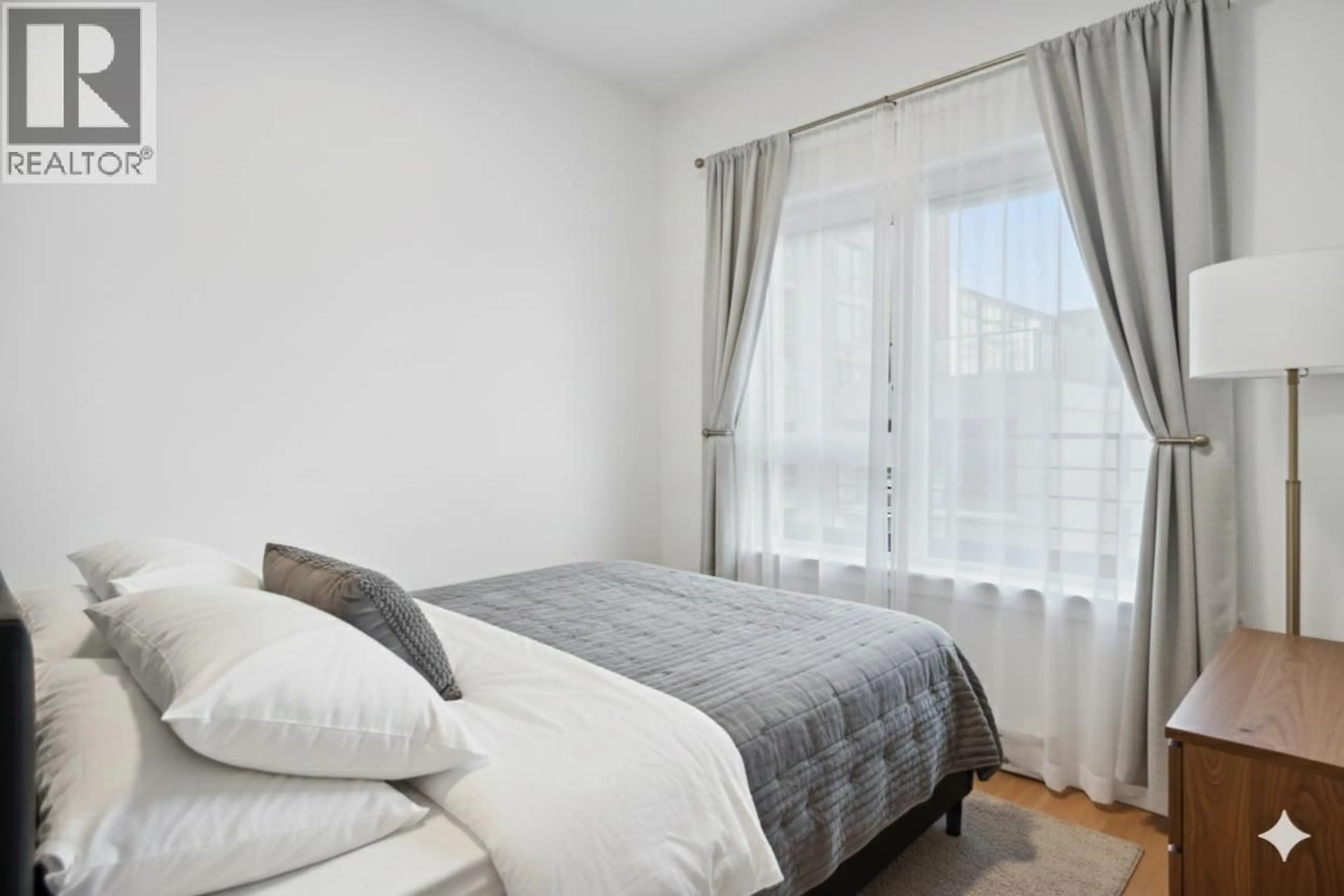 Bedroom with bed, unknown for 407 - 2666 DUKE STREET, Vancouver British Columbia V5R4S9