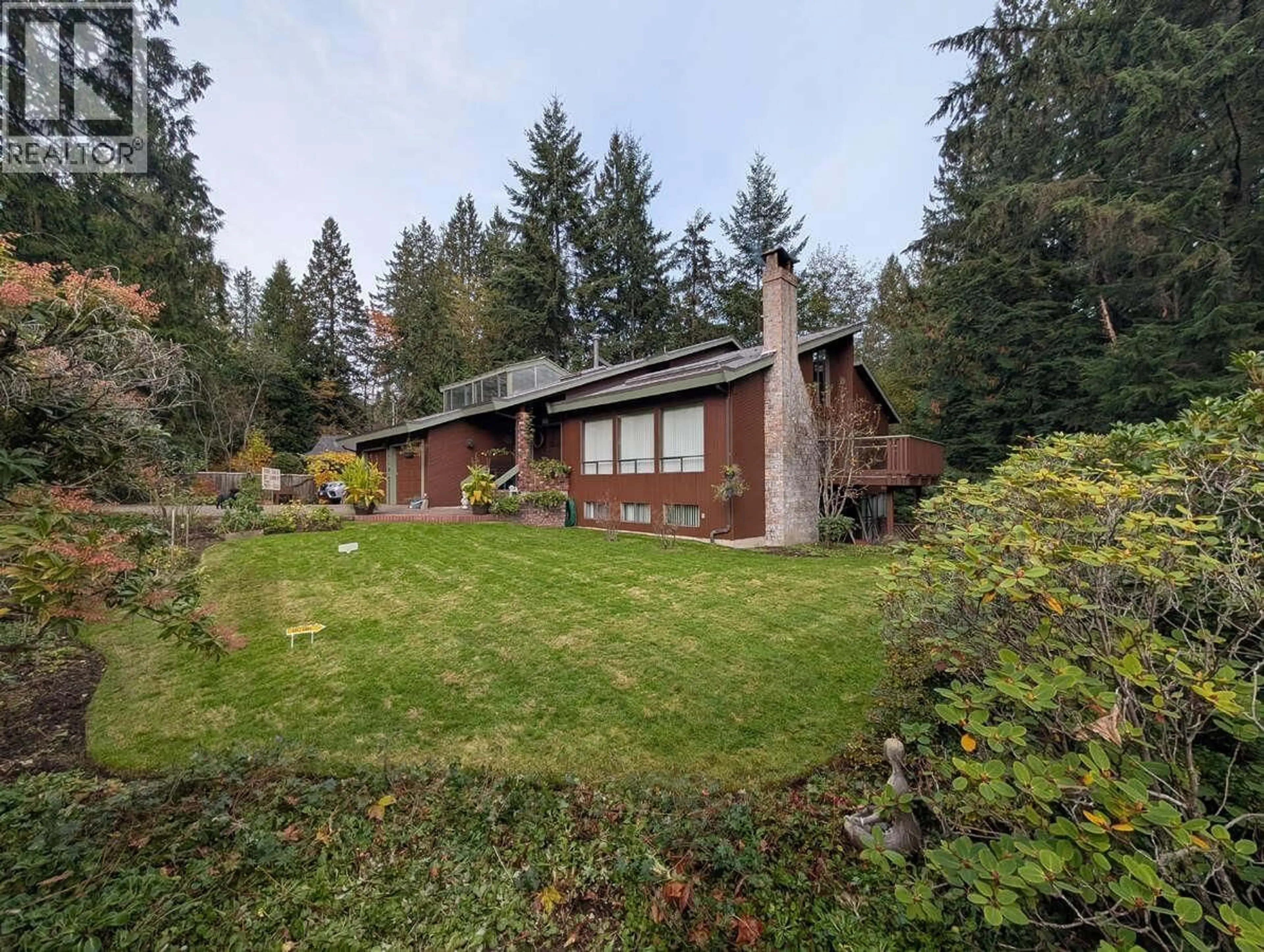 A pic from outside/outdoor area/front of a property/back of a property/a pic from drone, forest/trees view for 1498 CHAMBERLAIN DRIVE, North Vancouver British Columbia V7K1P6