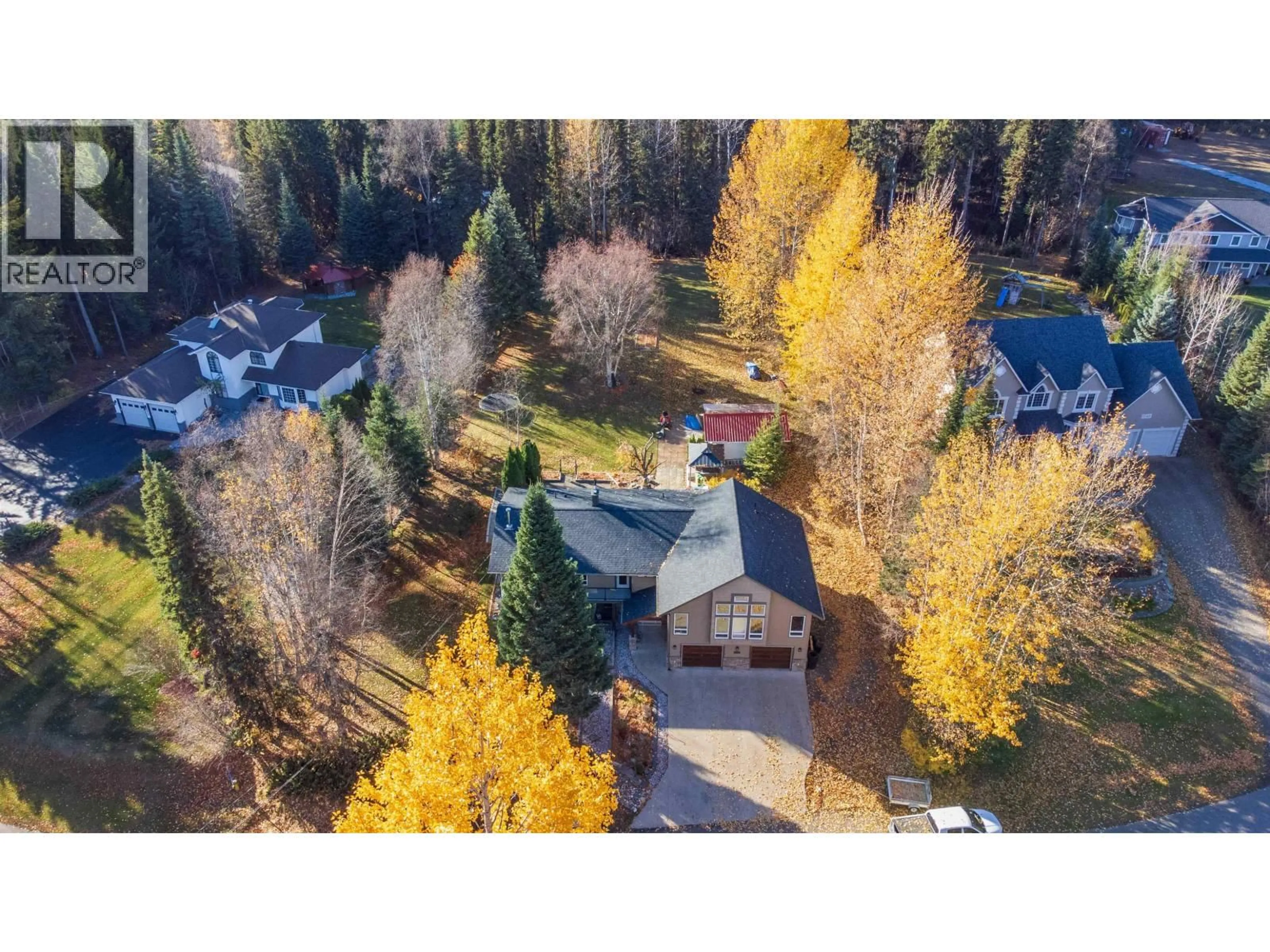 A pic from outside/outdoor area/front of a property/back of a property/a pic from drone, forest/trees view for 7125 VALLEYVIEW DRIVE, Prince George British Columbia V2K4C6