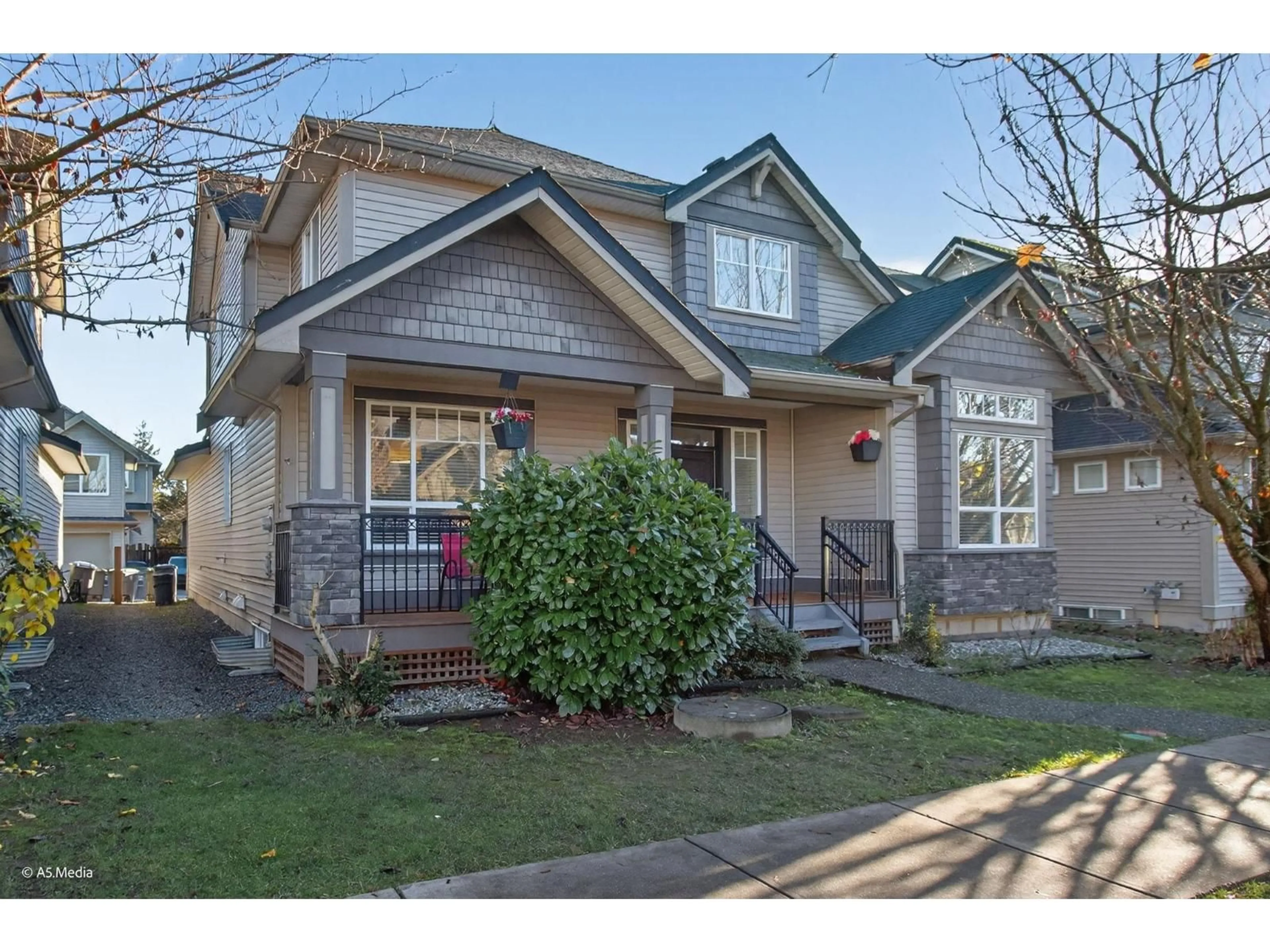 Home with vinyl exterior material, street for 7032 195A STREET, Surrey British Columbia V4N5Z2