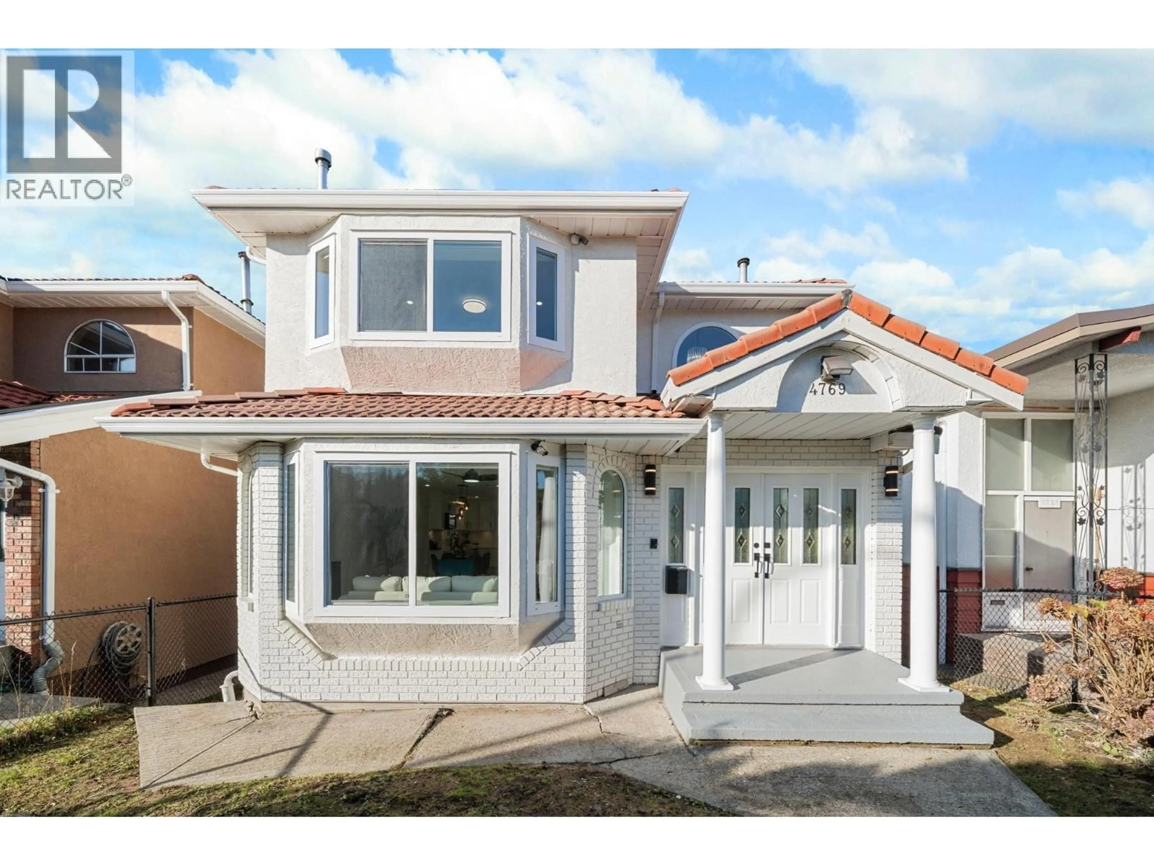 Home with vinyl exterior material, street for 4769 RUPERT STREET, Vancouver British Columbia V5R2J5