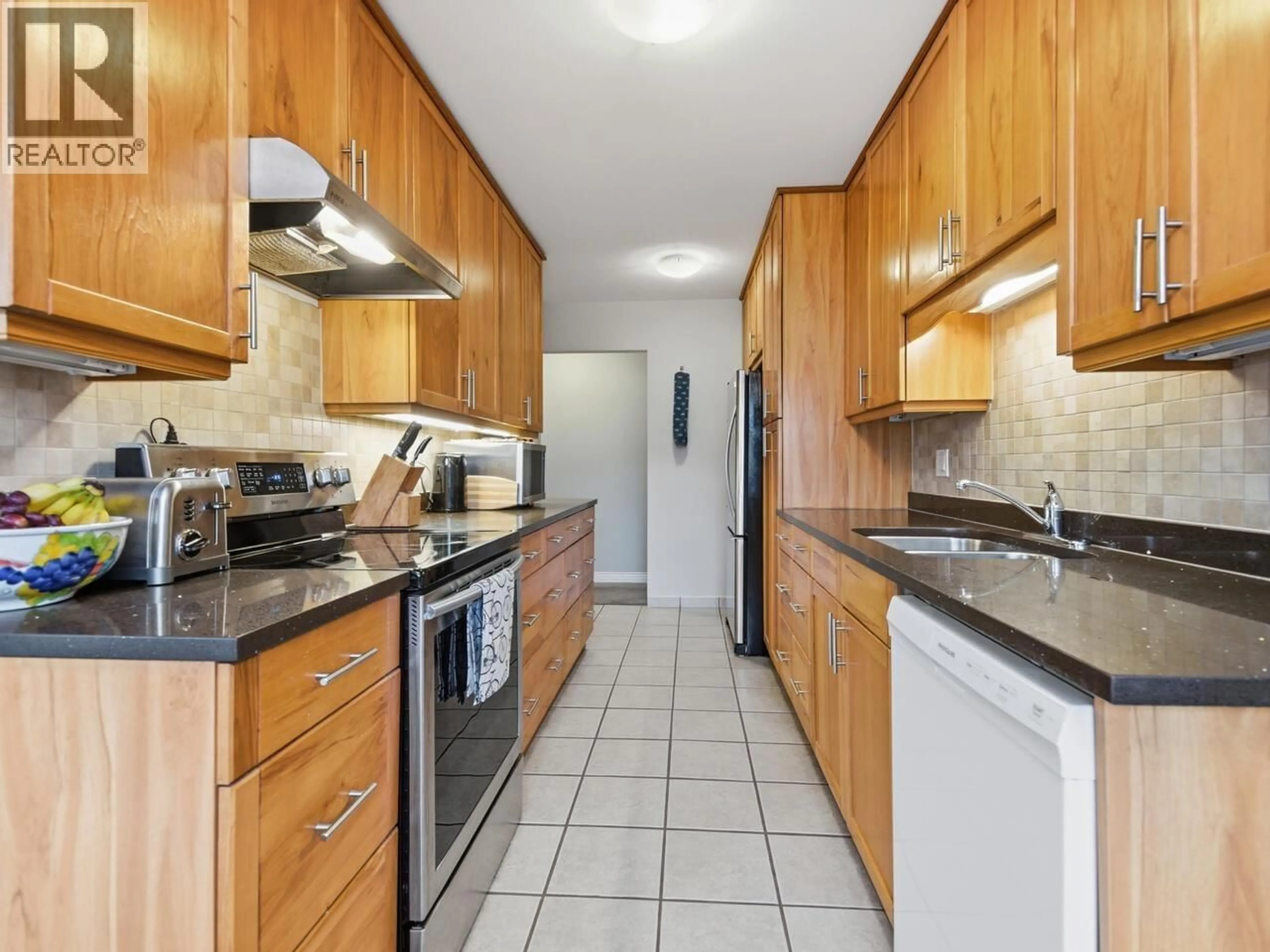 Standard kitchen, ceramic/tile floor for 312 - 3901 CARRIGAN COURT, Burnaby British Columbia V3N4K1