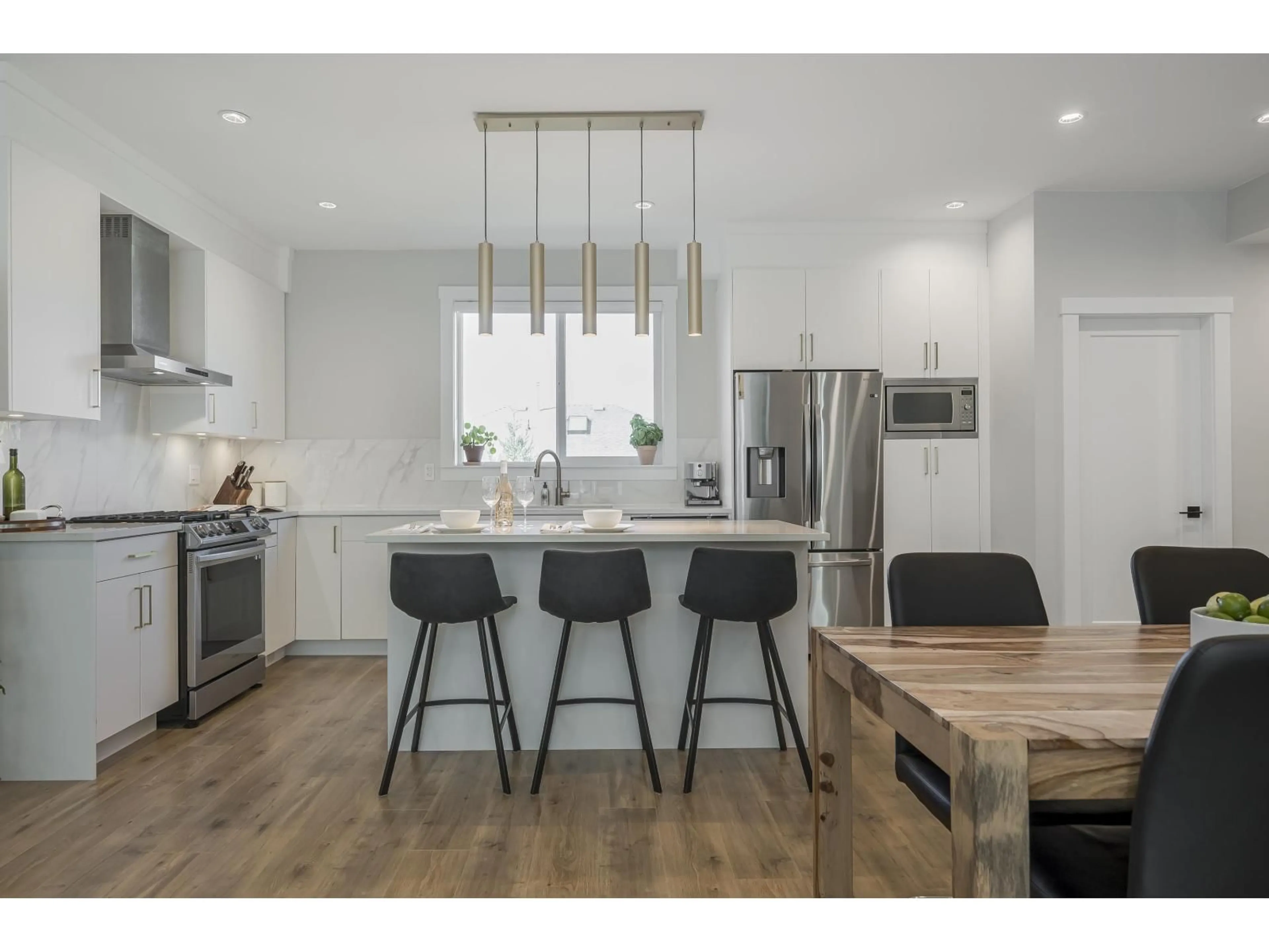 Open concept kitchen, wood/laminate floor for 65 - 1639 162 STREET, Surrey British Columbia V4A4Y1