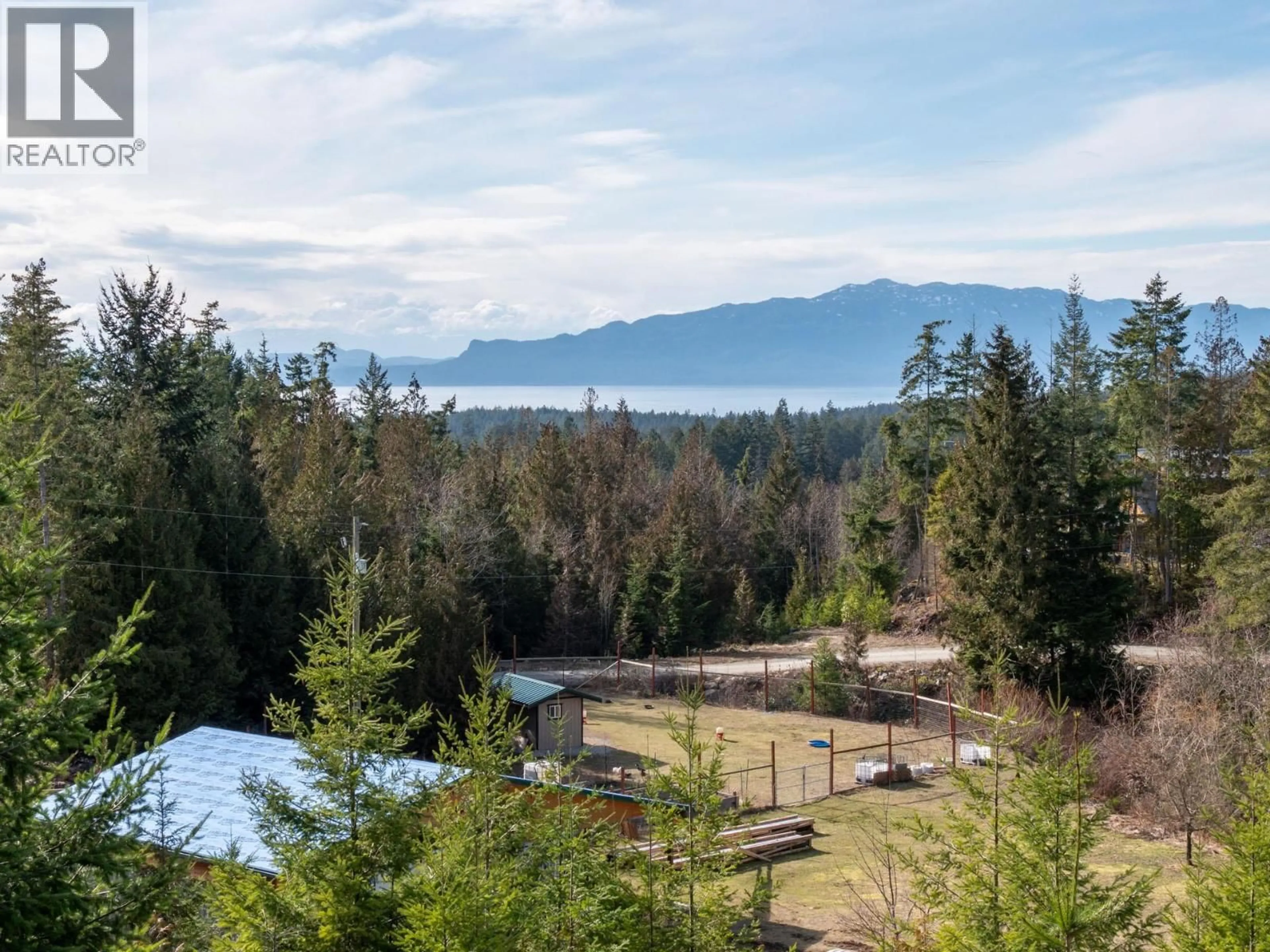 A pic from outside/outdoor area/front of a property/back of a property/a pic from drone, water/lake/river/ocean view for 9305 STEPHENS WAY, Halfmoon Bay British Columbia V7Z1G9
