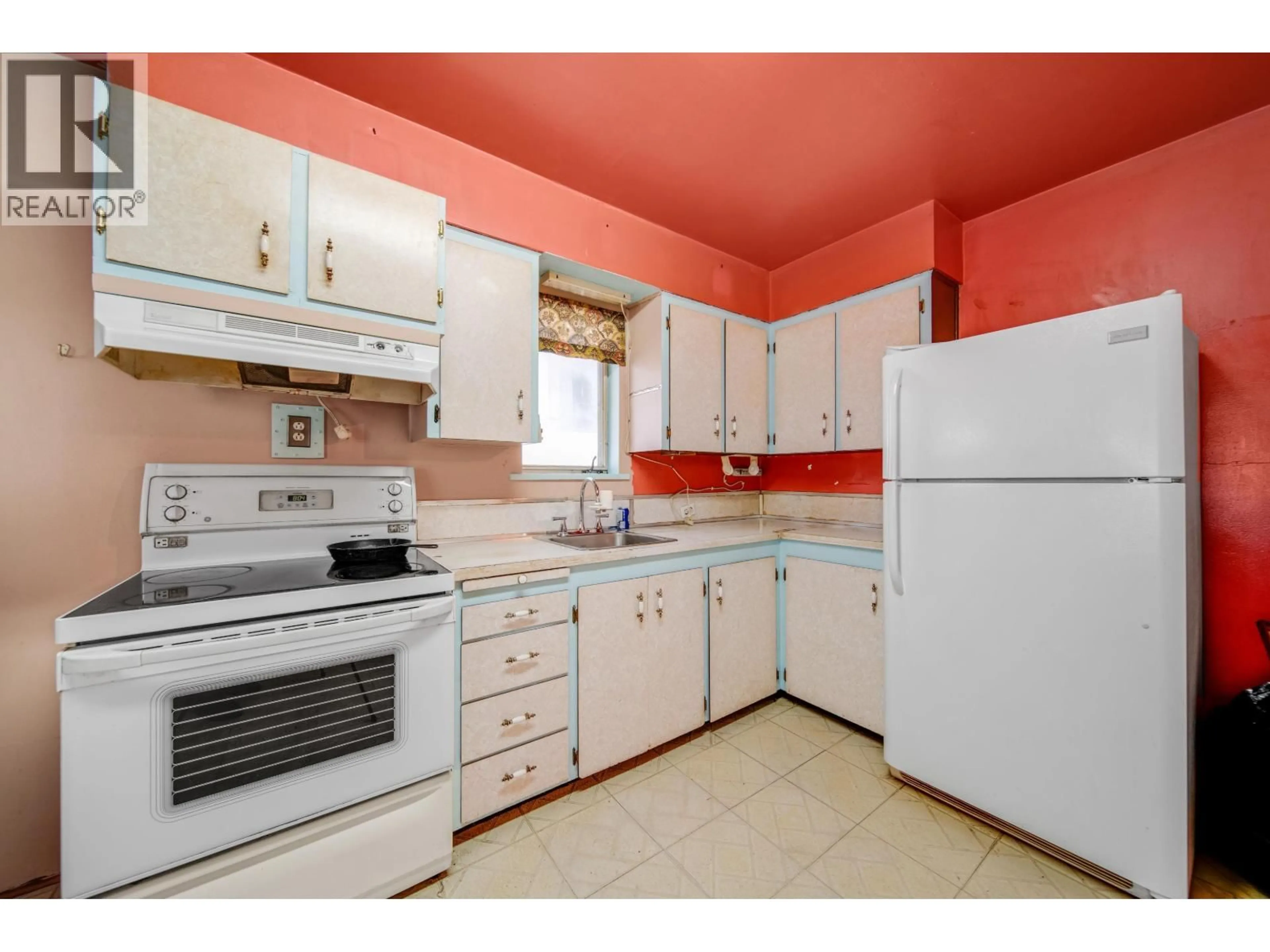 Standard kitchen, ceramic/tile floor for 5284 SLOCAN STREET, Vancouver British Columbia V5R2A7