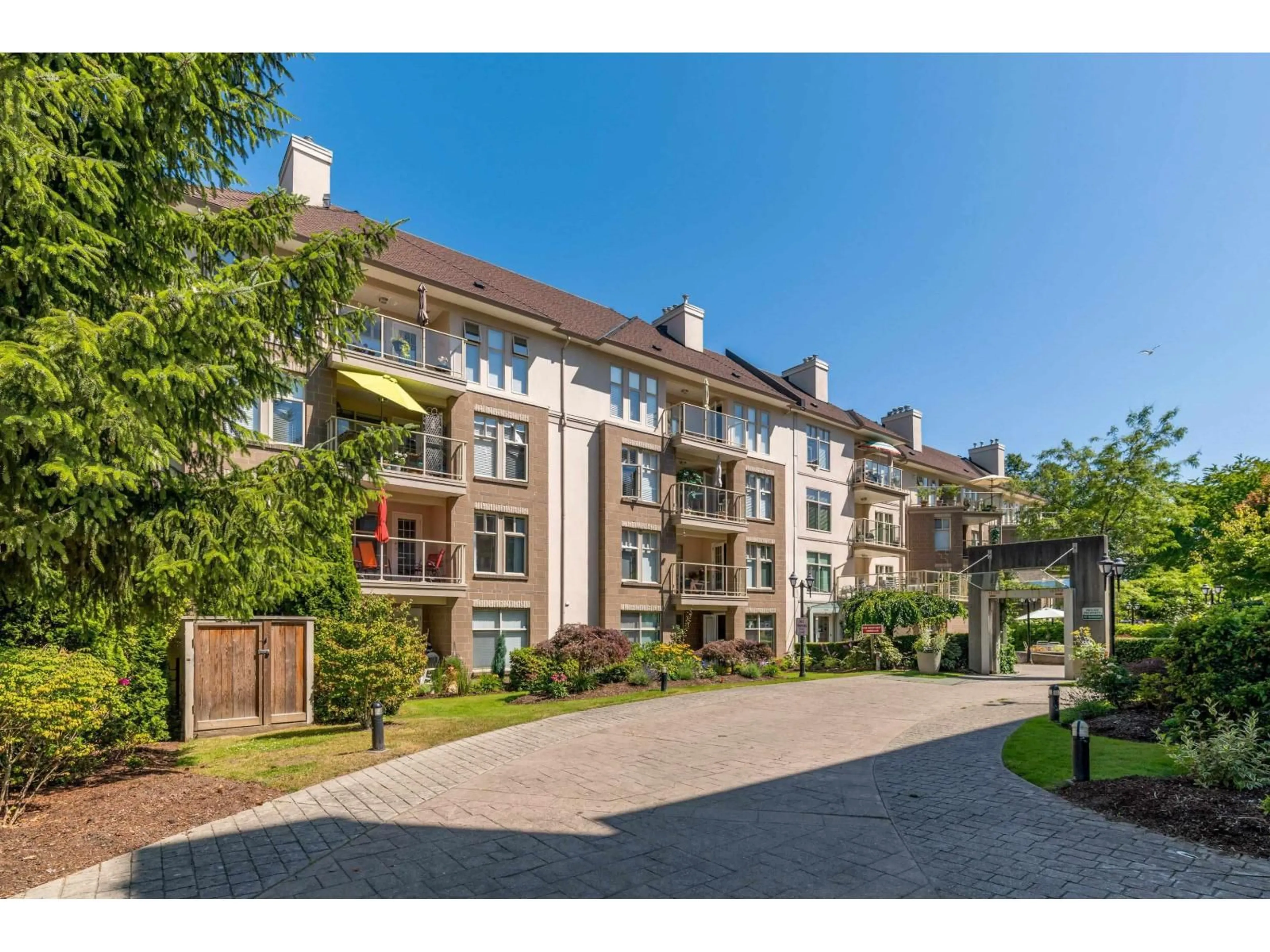 A pic from outside/outdoor area/front of a property/back of a property/a pic from drone, street for 209 - 15350 19A AVENUE, Surrey British Columbia V4A9W1