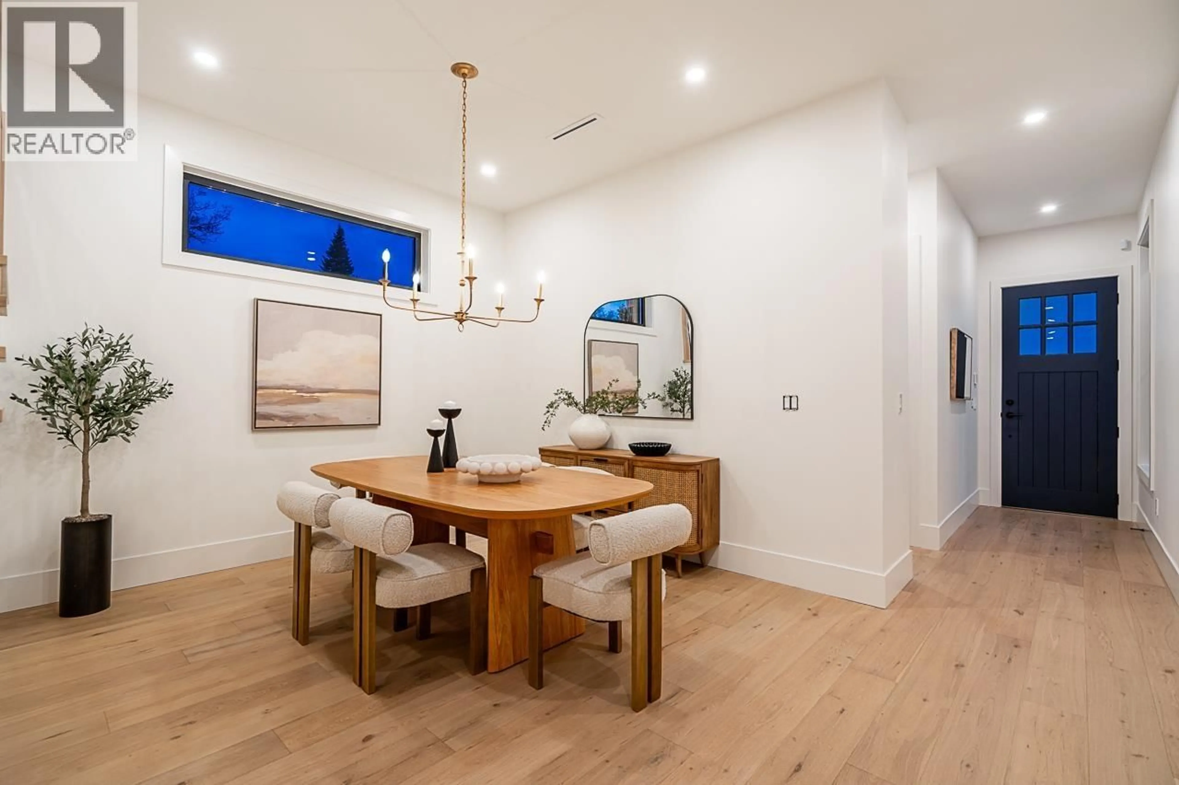 Dining room, wood/laminate floor for 1228 STELLERS JAY PLACE, Delta British Columbia V4M2A9