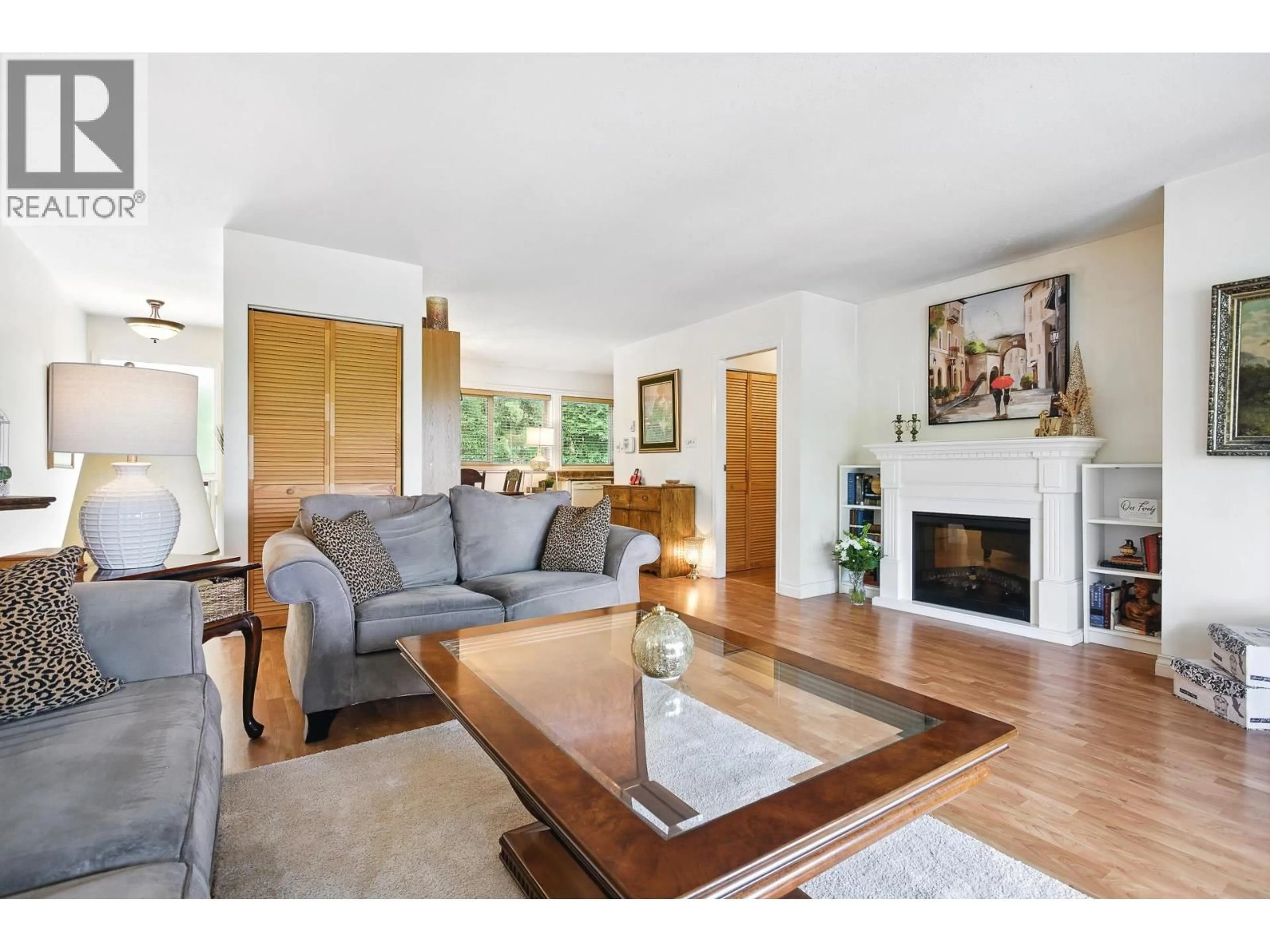 Living room with furniture, wood/laminate floor for 1087 CECILE DRIVE, Port Moody British Columbia V3H1M6