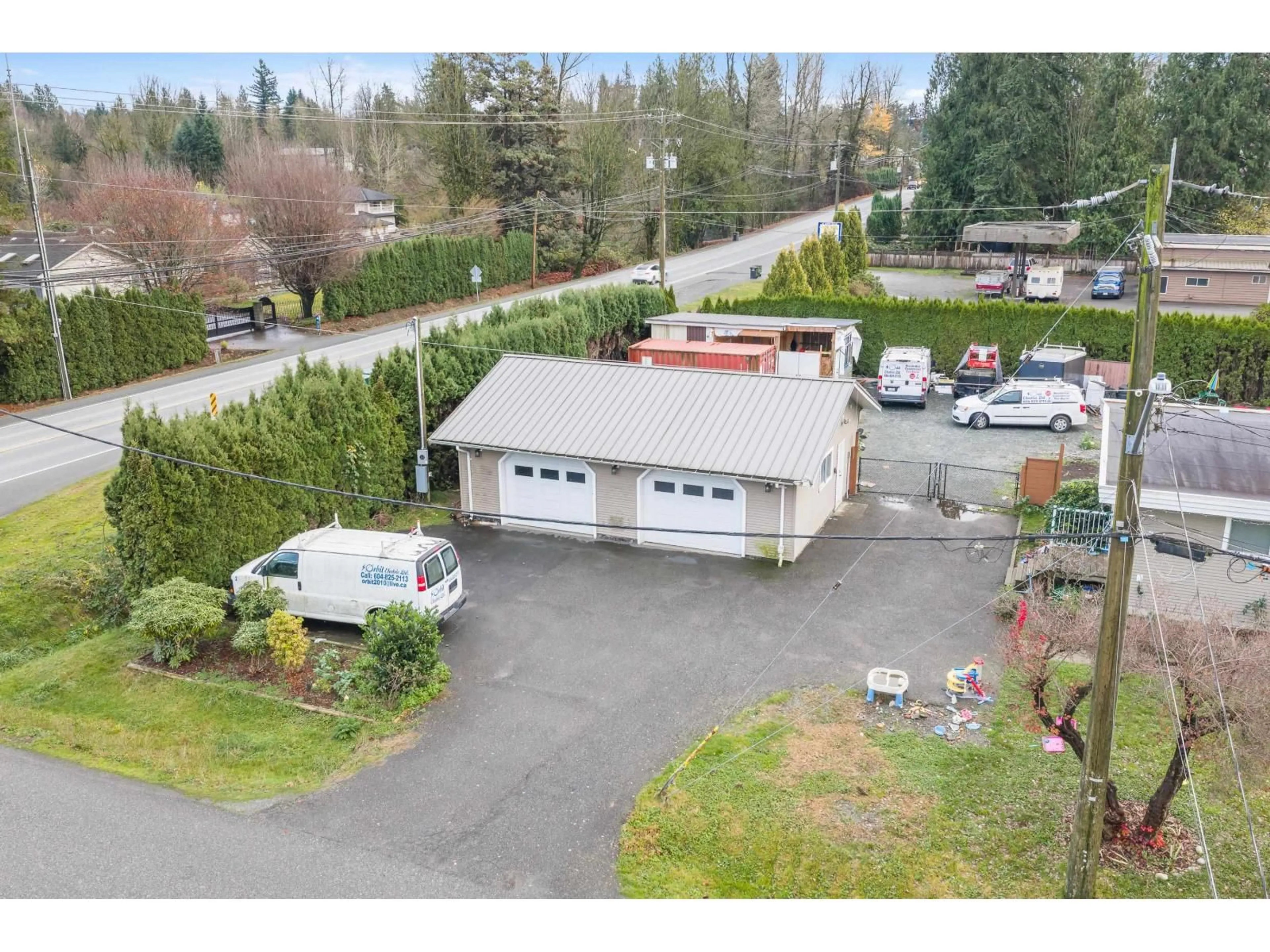 A pic from outside/outdoor area/front of a property/back of a property/a pic from drone, street for 30388 SUNSET CRESCENT, Abbotsford British Columbia V4X1Y5