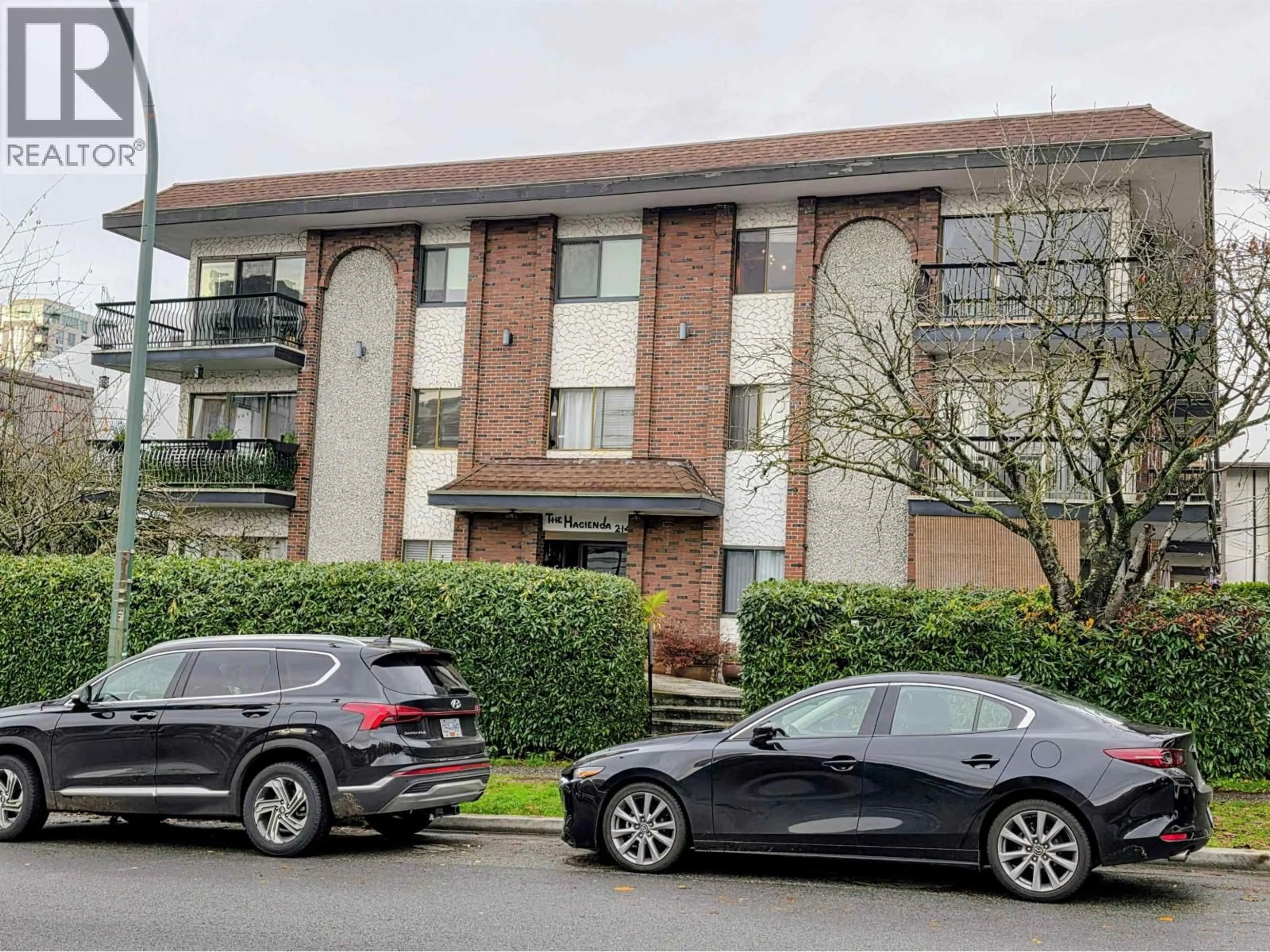 A pic from outside/outdoor area/front of a property/back of a property/a pic from drone, street for 208 - 214 15TH STREET, North Vancouver British Columbia V7L2R3