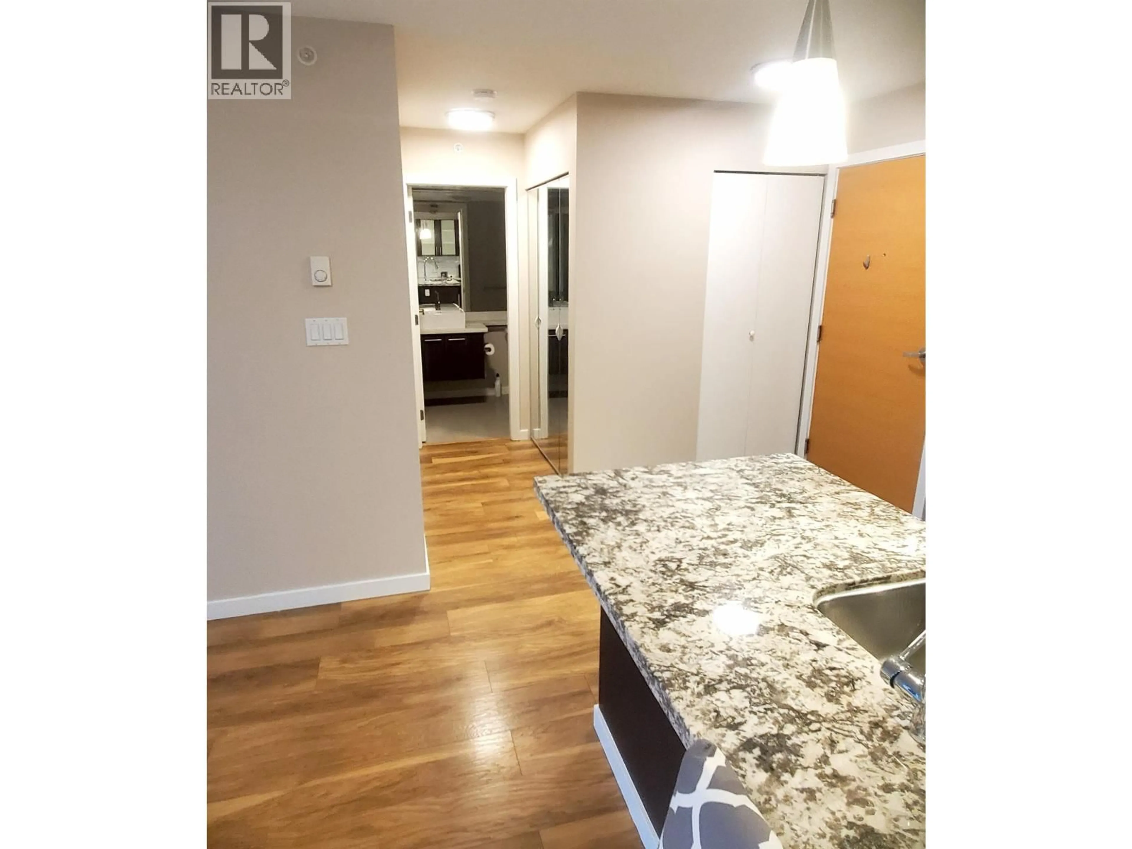 Open concept kitchen, wood/laminate floor for 607 - 7888 SABA ROAD, Richmond British Columbia V6Y0A2