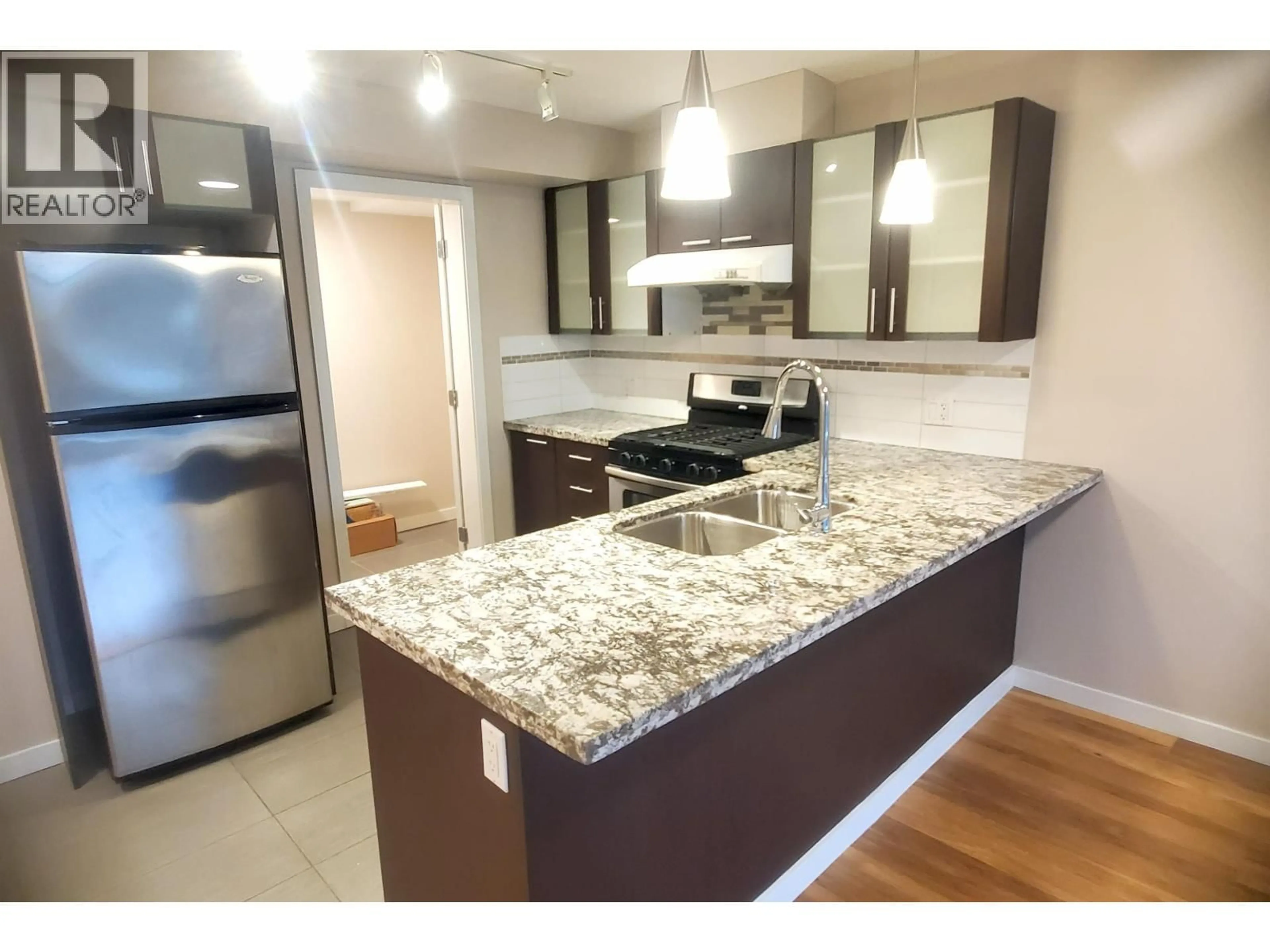 Open concept kitchen, unknown for 607 - 7888 SABA ROAD, Richmond British Columbia V6Y0A2