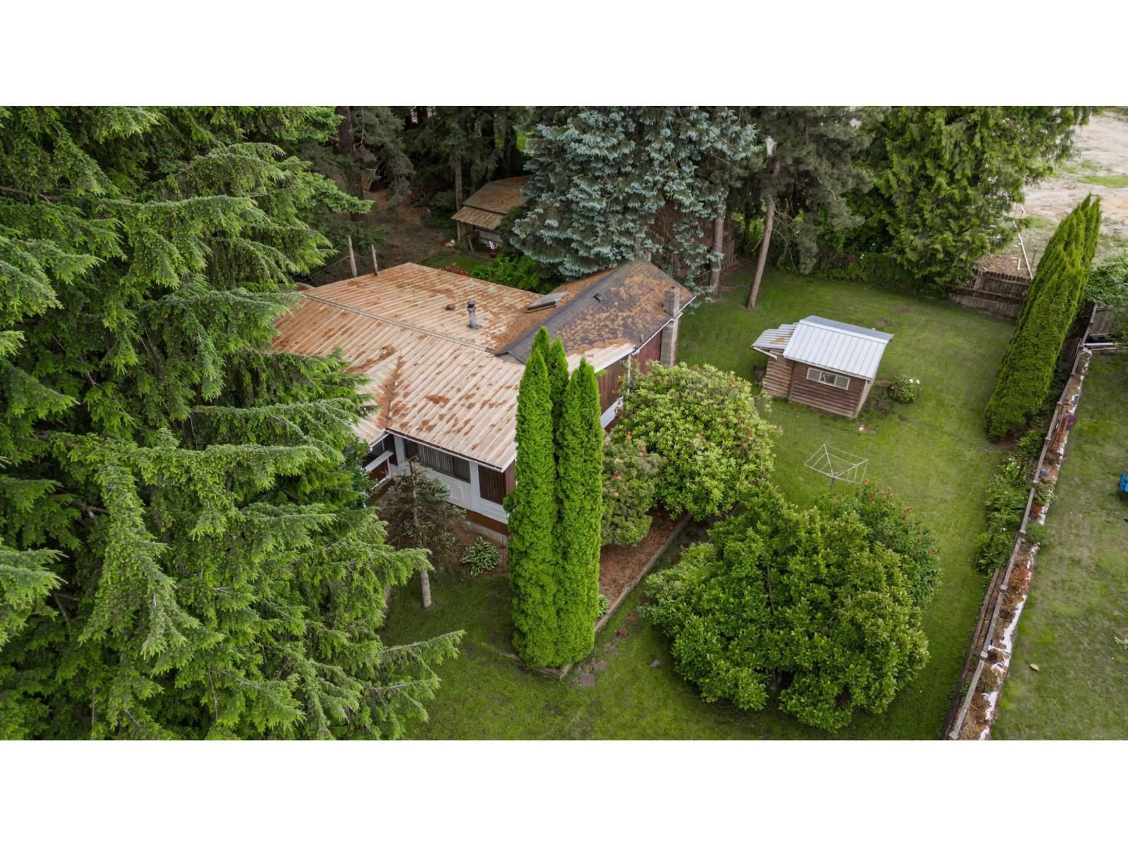 A pic from outside/outdoor area/front of a property/back of a property/a pic from drone, forest/trees view for 2161 MARTENS STREET, Abbotsford British Columbia V2T6M6