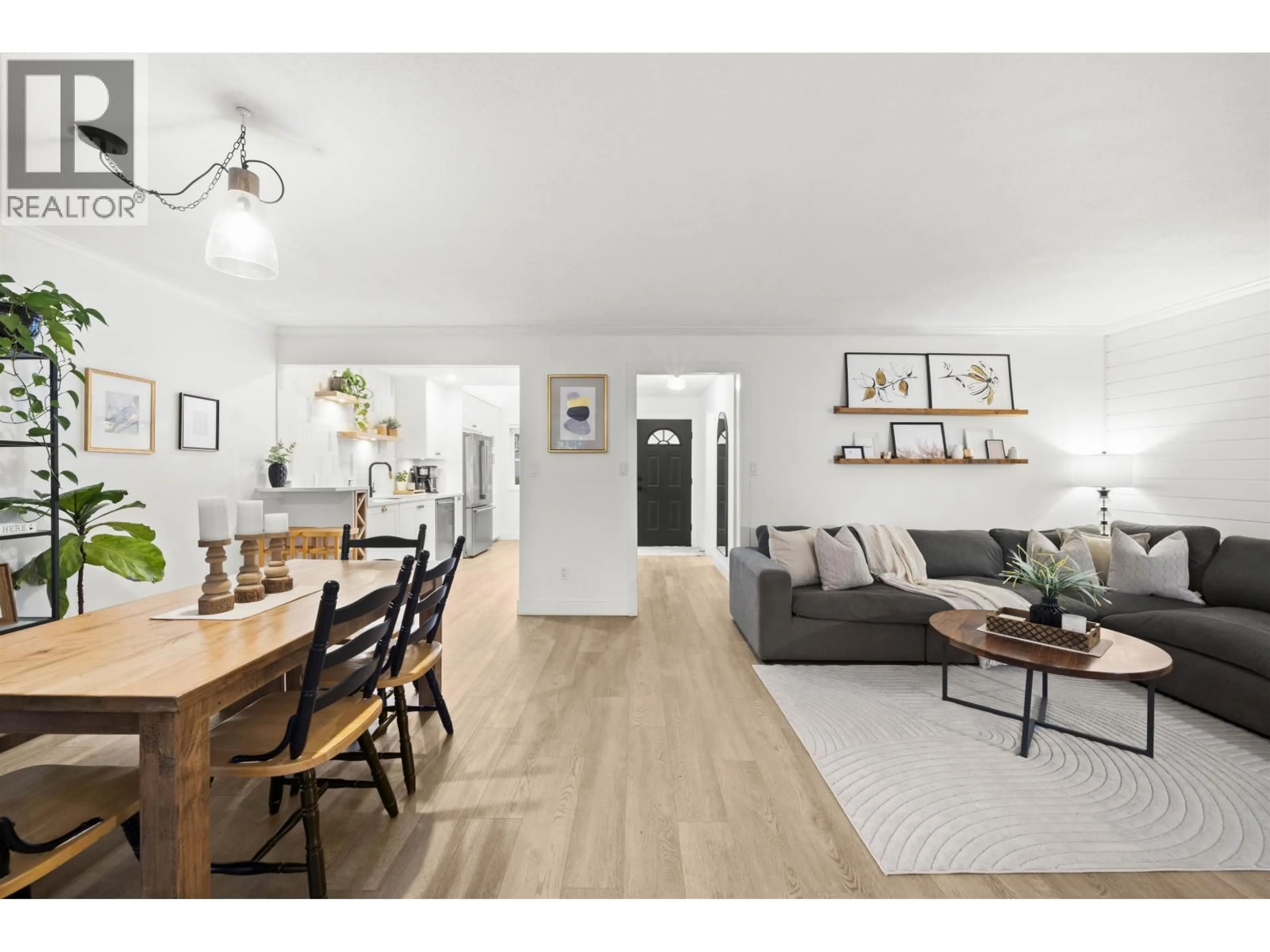 Open concept kitchen, wood/laminate floor for 10 - 4855 57 STREET, Delta British Columbia V4K3E7