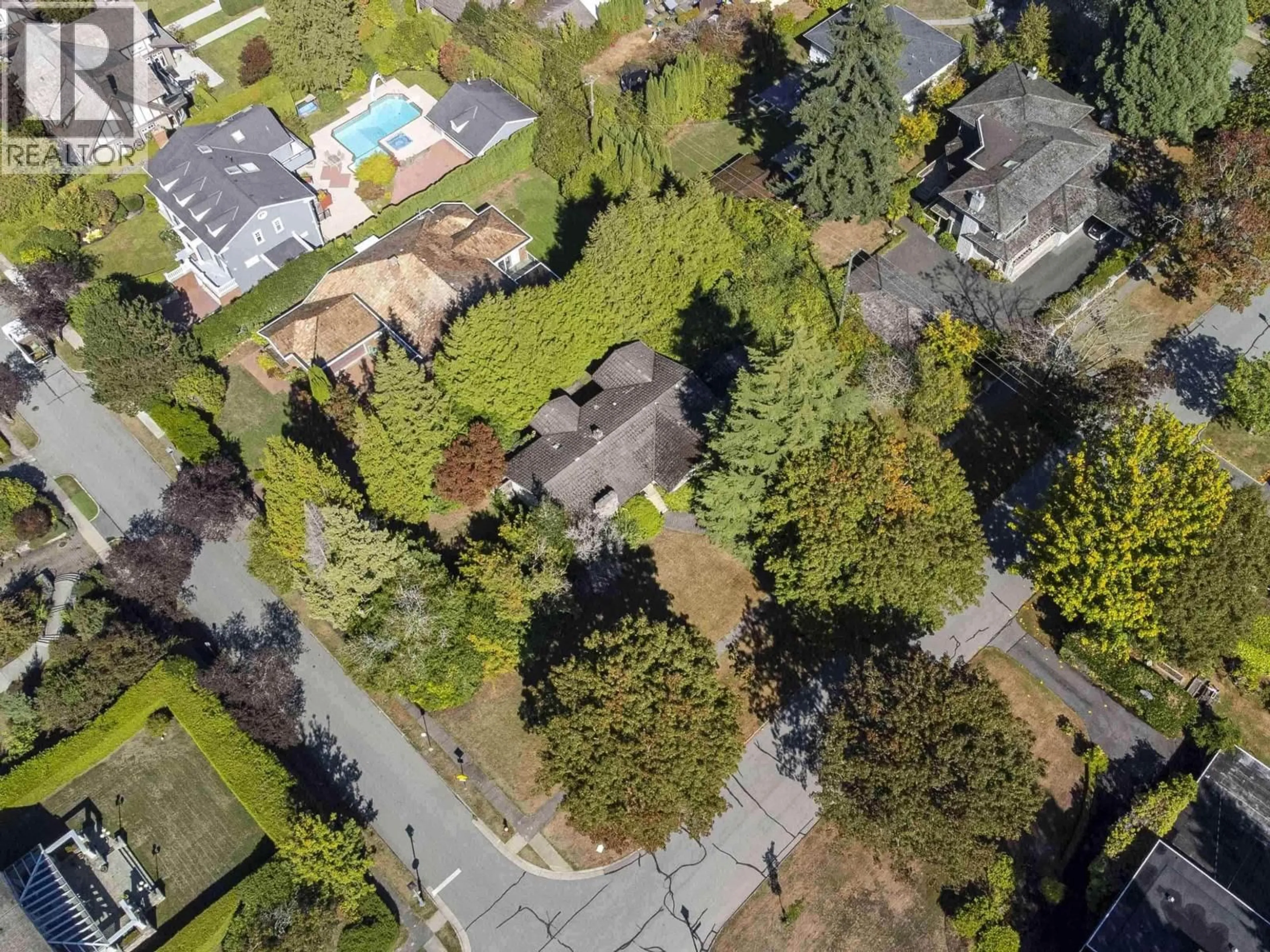 A pic from outside/outdoor area/front of a property/back of a property/a pic from drone, forest/trees view for 5595 COLLEGE HIGHROAD, Vancouver British Columbia V6T1G9
