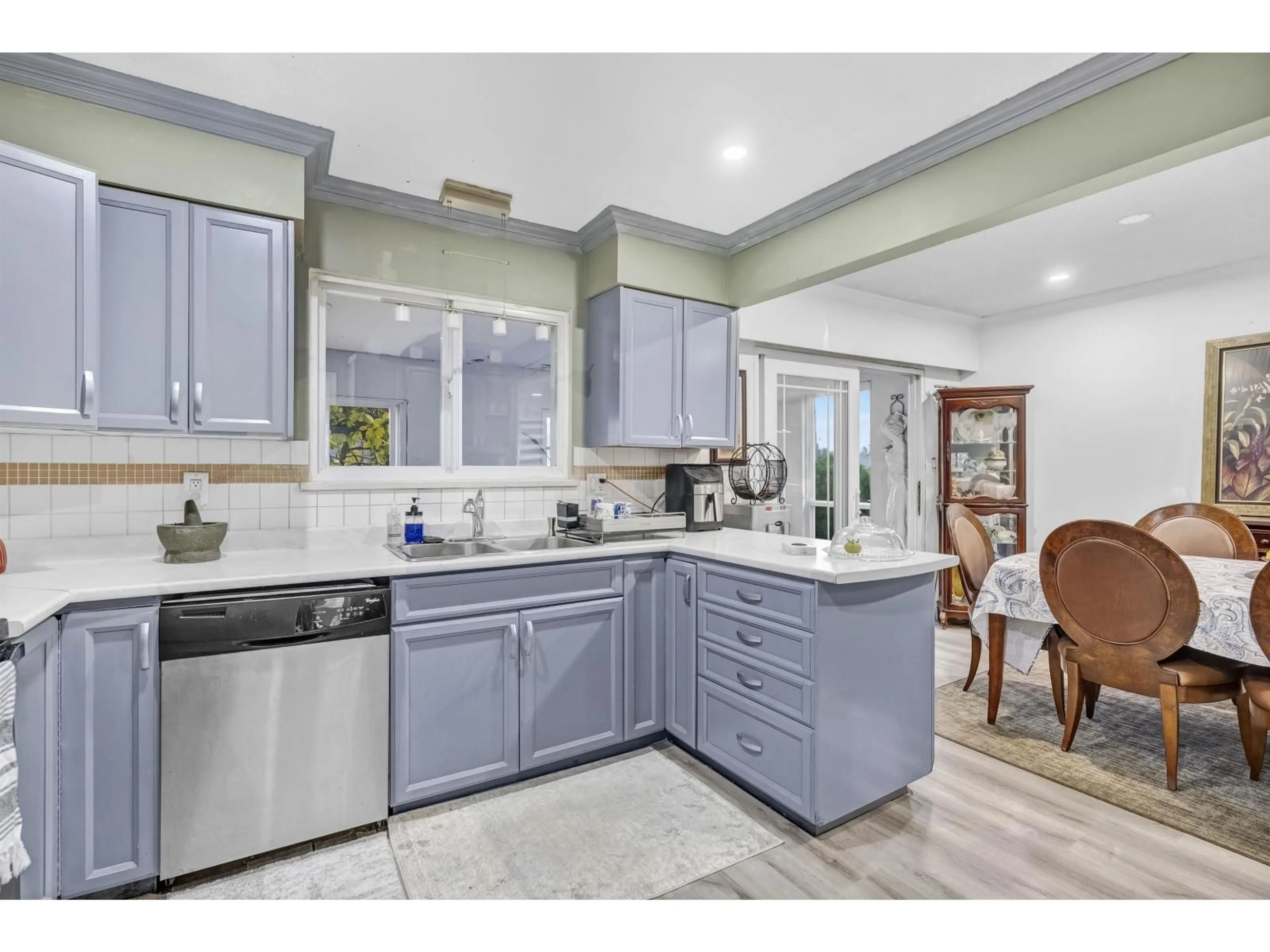 Open concept kitchen, ceramic/tile floor for 8132 116 STREET, Delta British Columbia V4C5T9