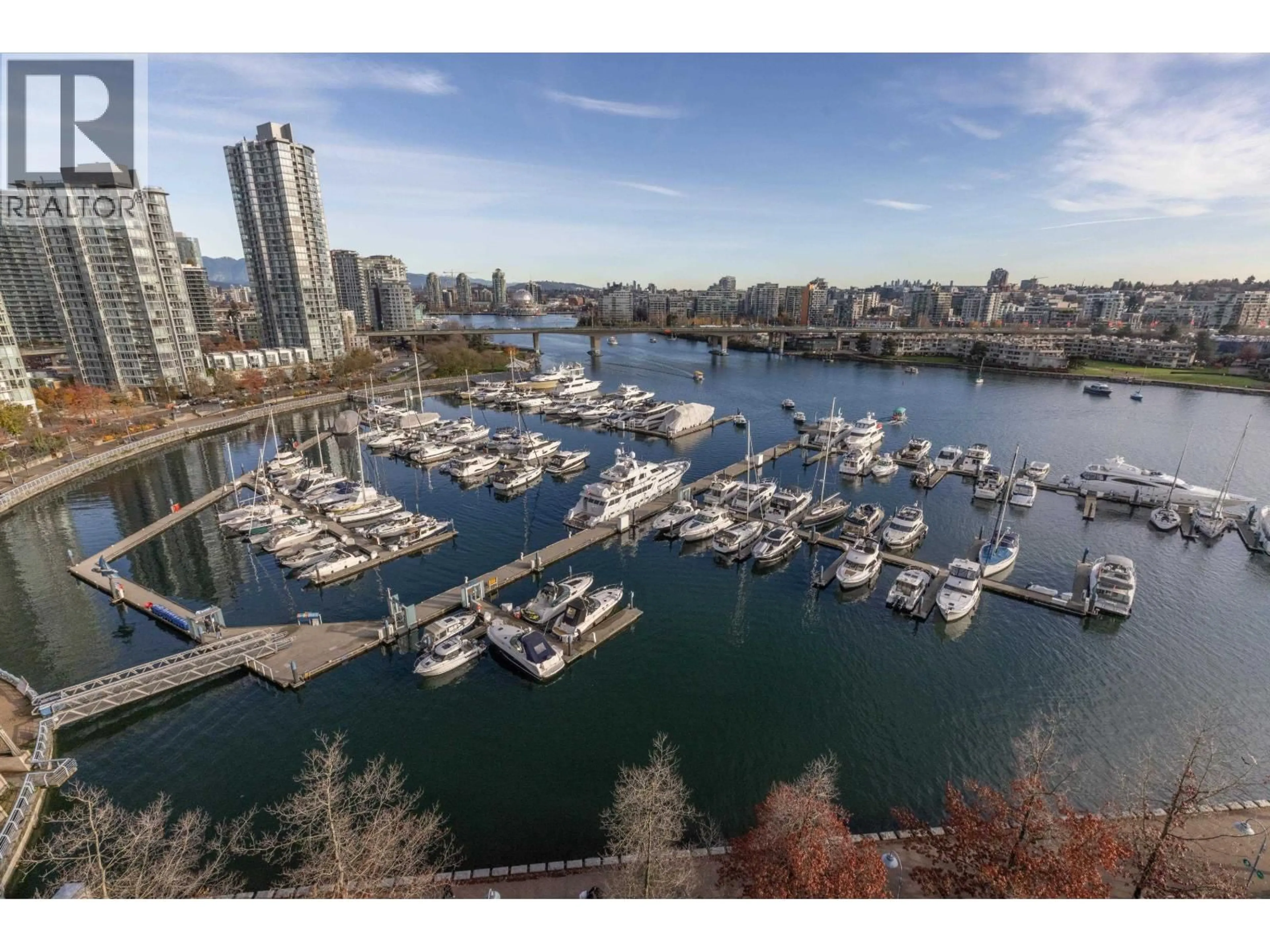 A pic from outside/outdoor area/front of a property/back of a property/a pic from drone, water/lake/river/ocean view for 1601 - 1228 MARINASIDE CRESCENT, Vancouver British Columbia V6Z2W4