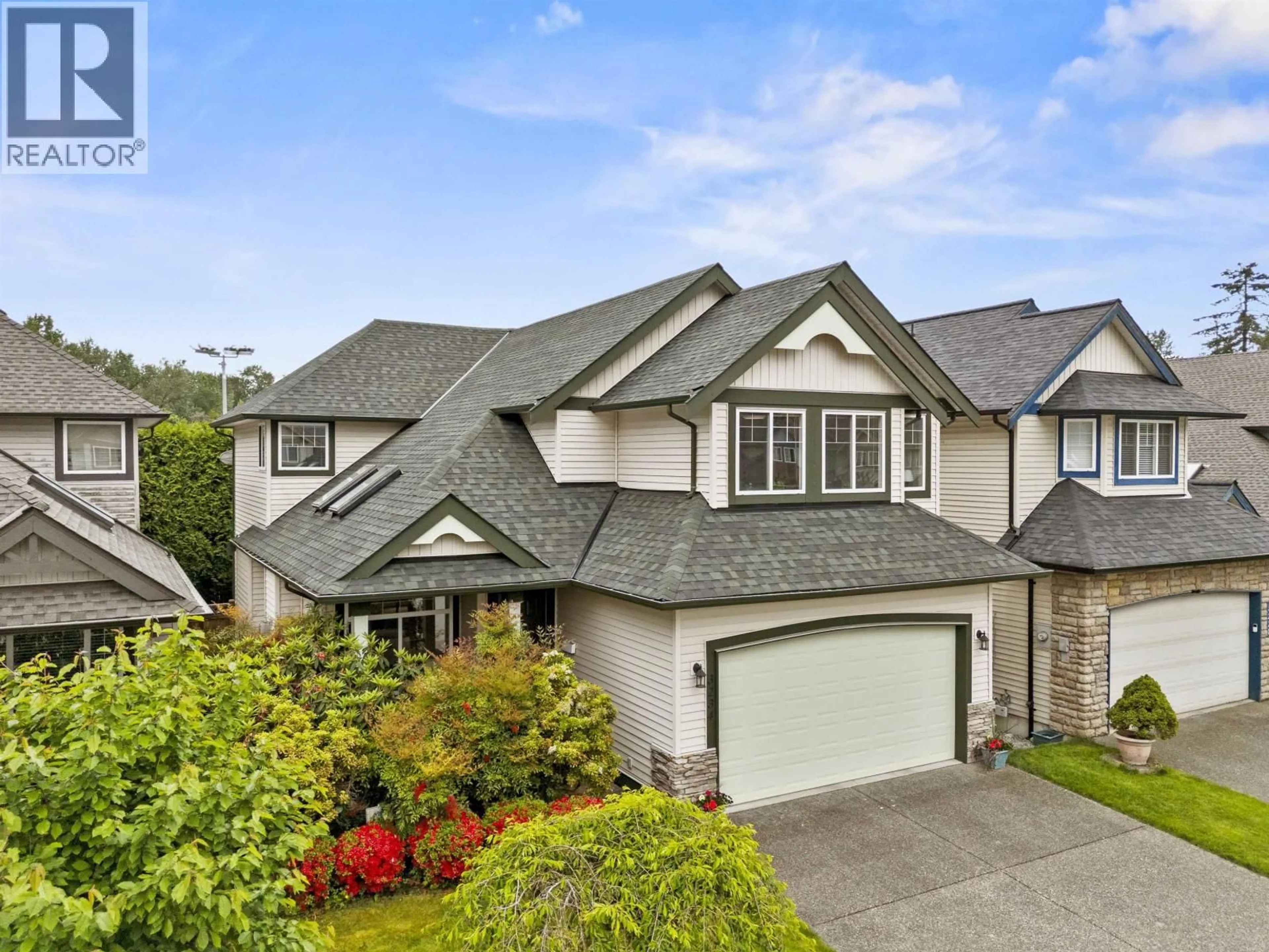 Home with vinyl exterior material, street for 3234 OSBORNE STREET, Port Coquitlam British Columbia V3B8C8