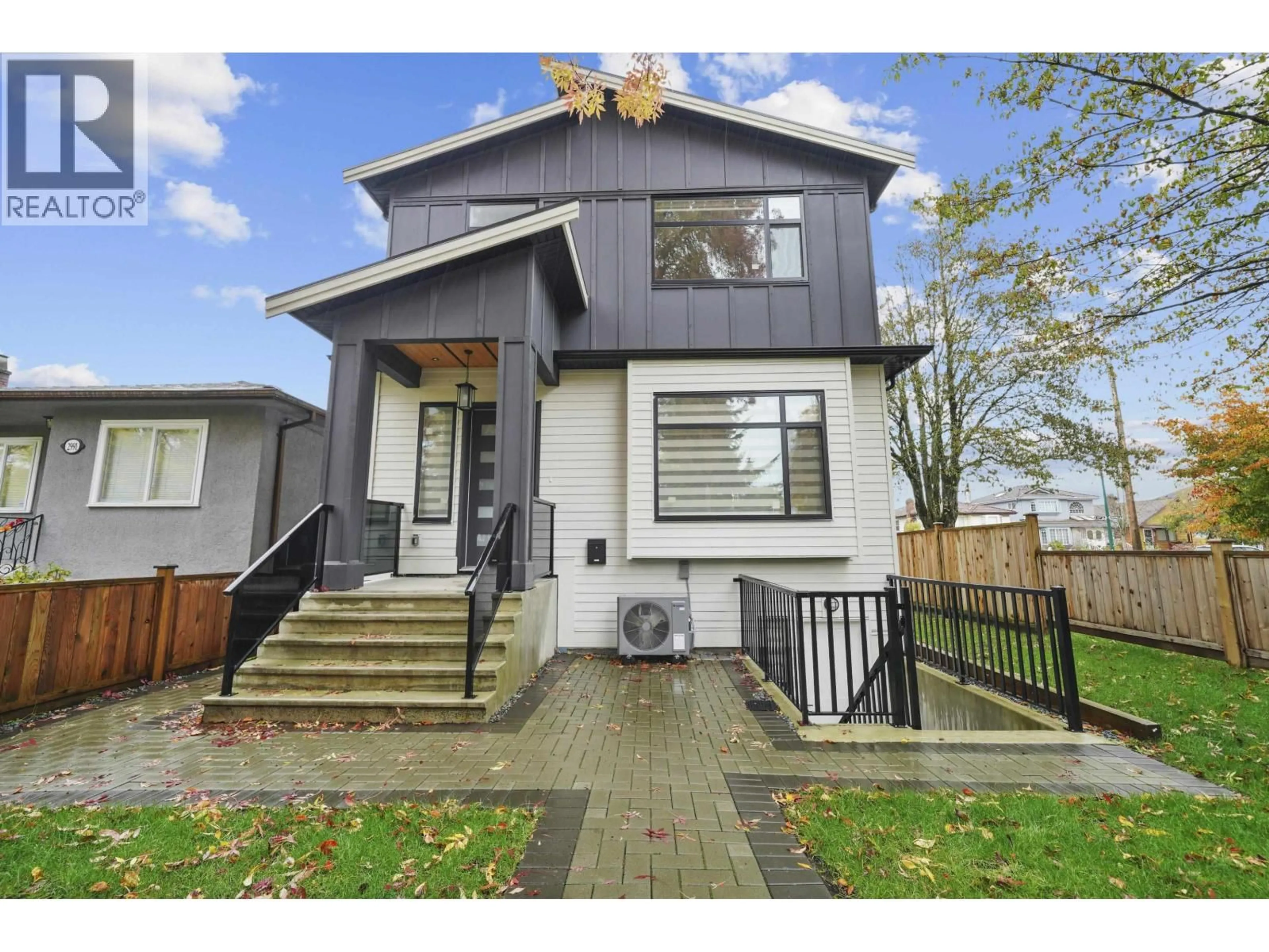 Home with vinyl exterior material, street for 2995 17TH AVENUE, Vancouver British Columbia V5M2N4