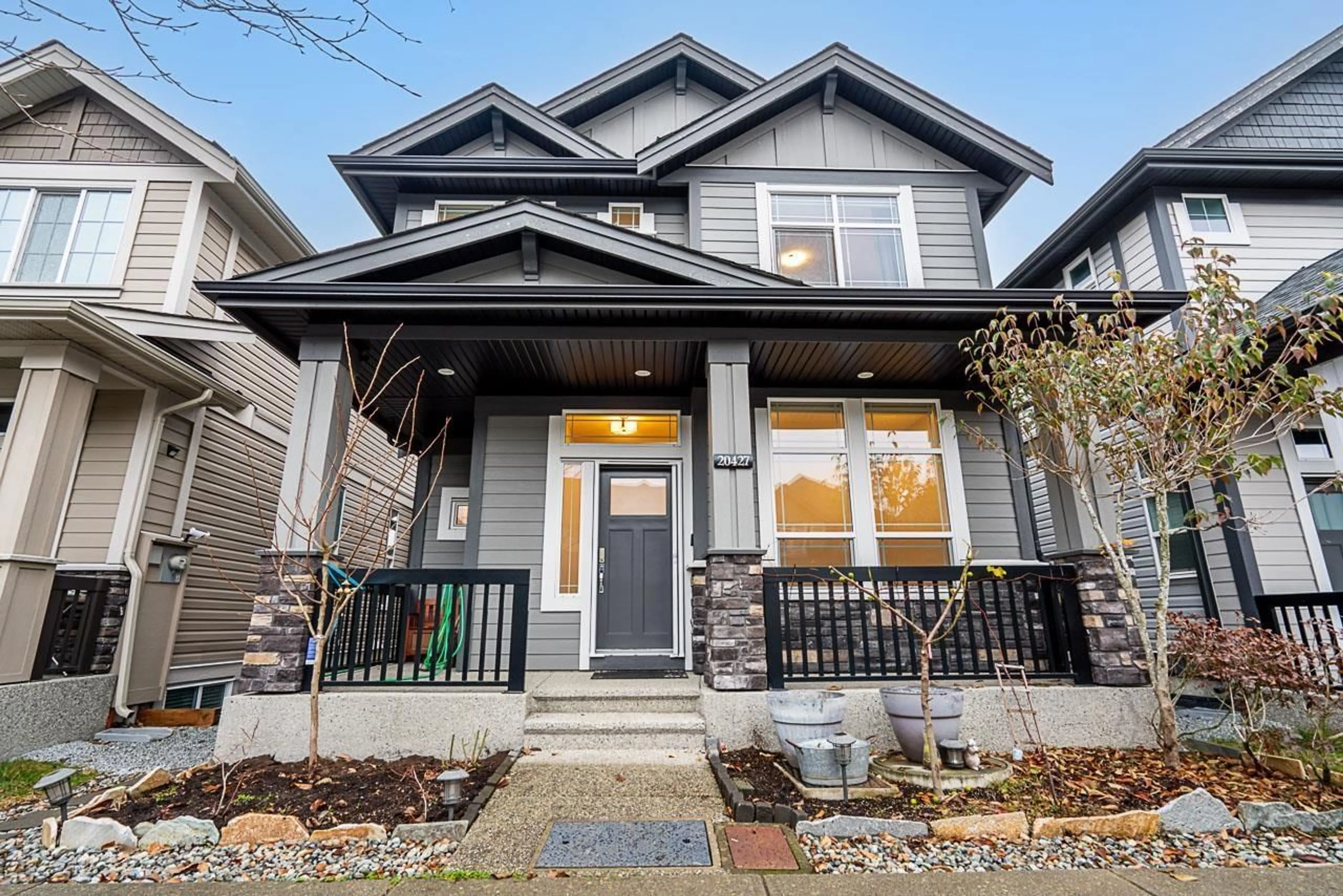 Home with vinyl exterior material, street for 20427 83B AVENUE, Langley British Columbia V2Y0R6