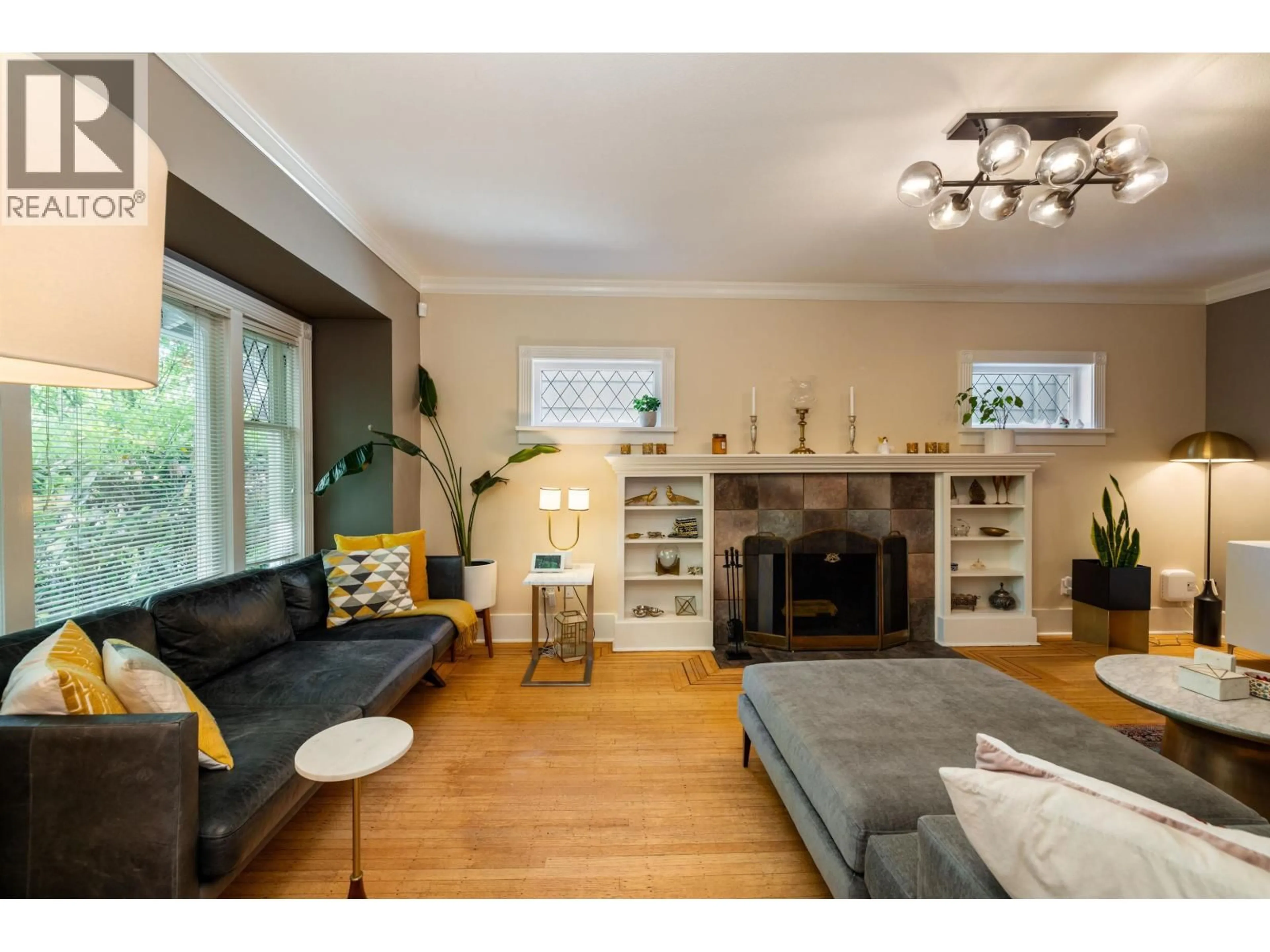 Living room with furniture, wood/laminate floor for 4343 11TH AVENUE, Vancouver British Columbia V6R2L9