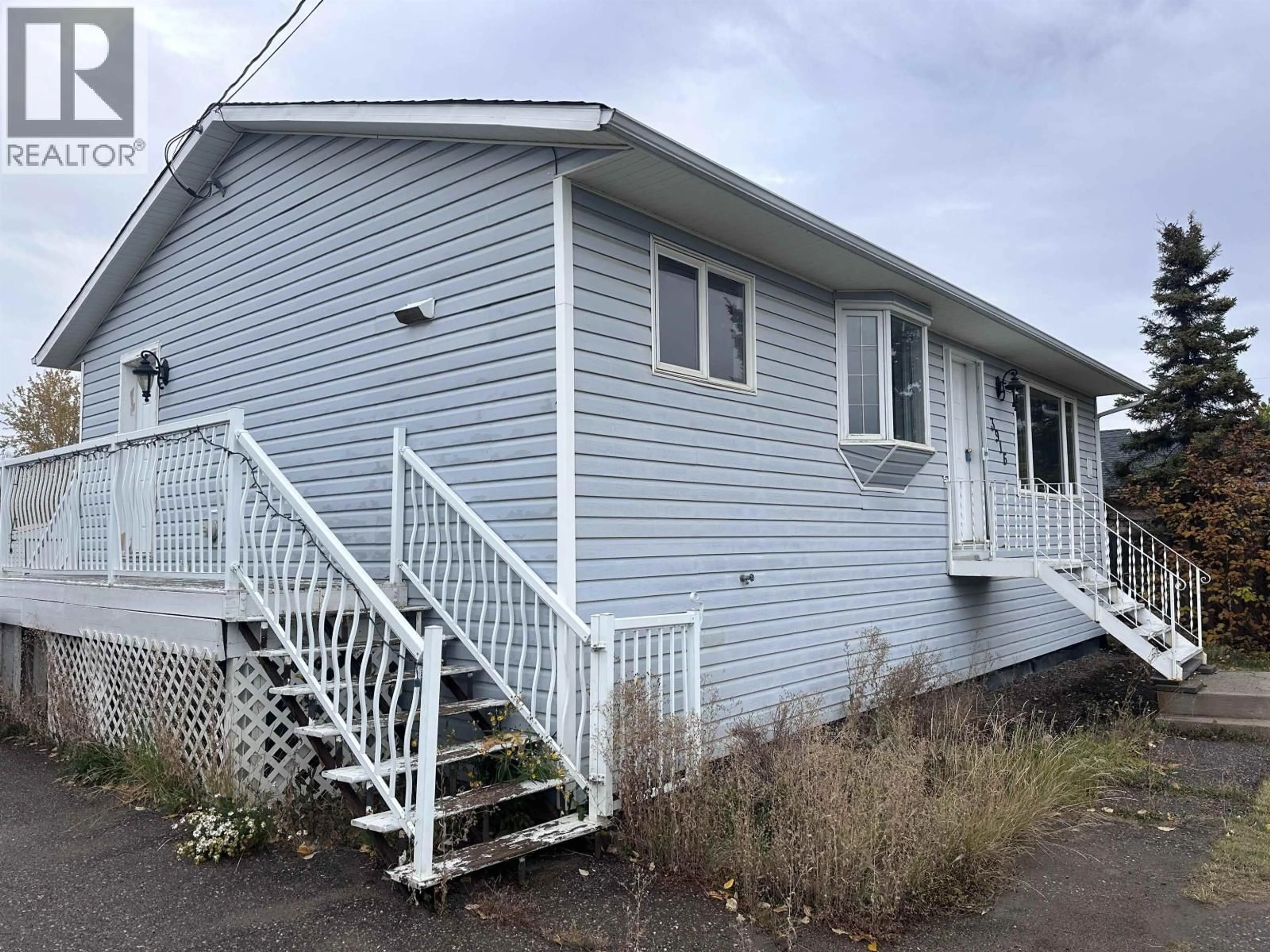Home with vinyl exterior material, building for 3916 COTTONWOOD ROAD, Fort Nelson British Columbia V0C1R0
