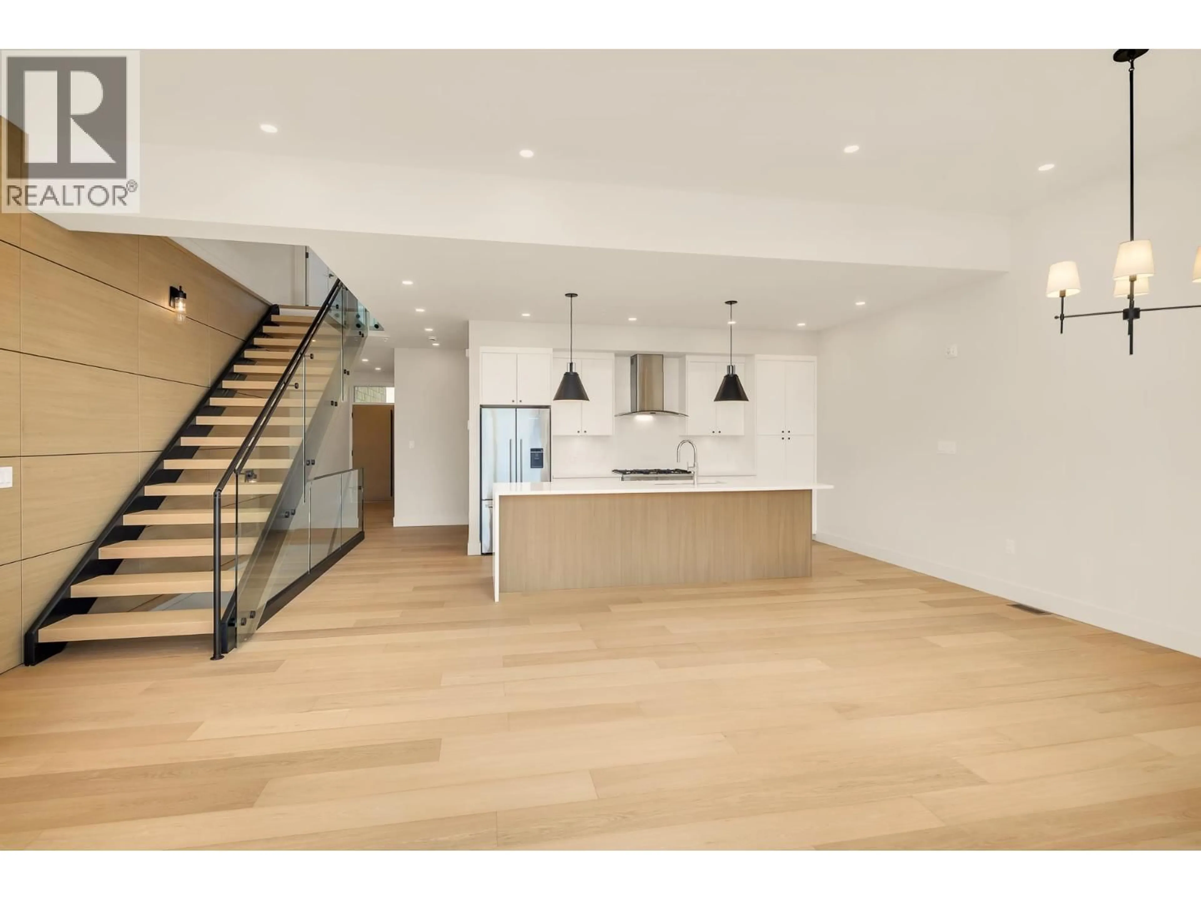 Open concept kitchen, wood/laminate floor for 5 - 3407 MAMQUAM ROAD, Squamish British Columbia V8B1E4