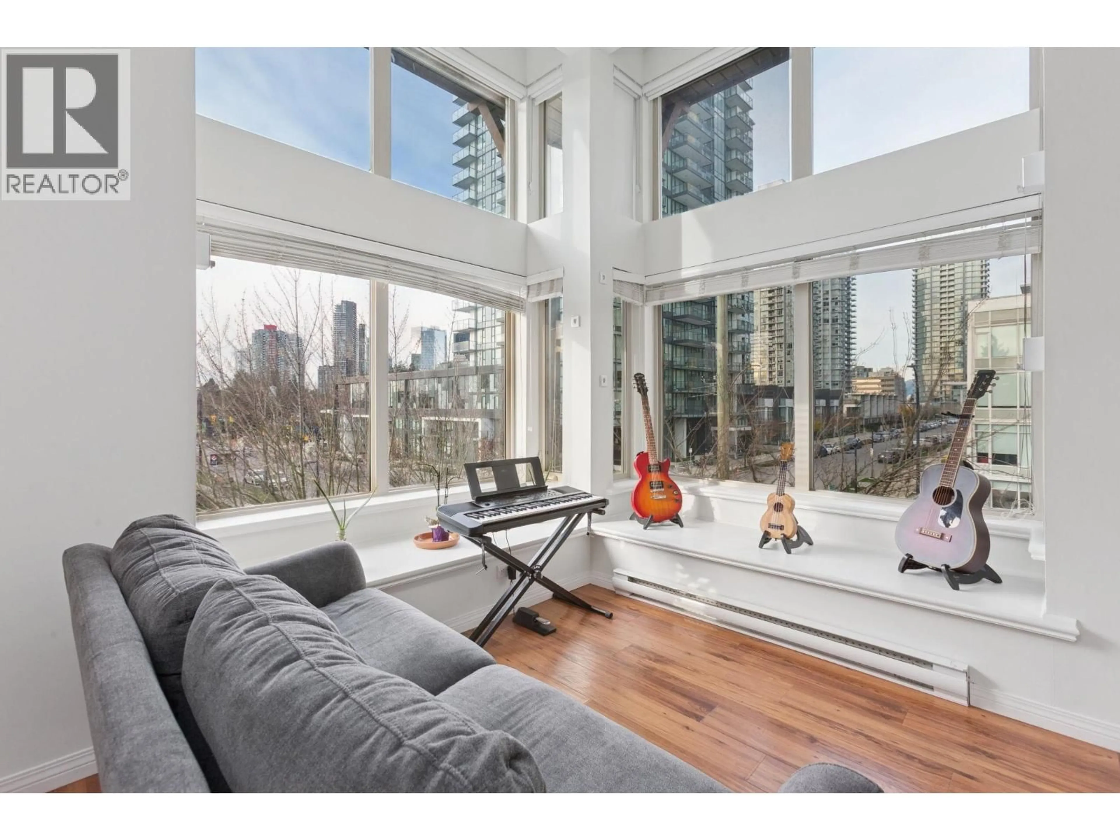 Living room with furniture, wood/laminate floor for 301 - 5000 IMPERIAL STREET, Burnaby British Columbia V5J1C8