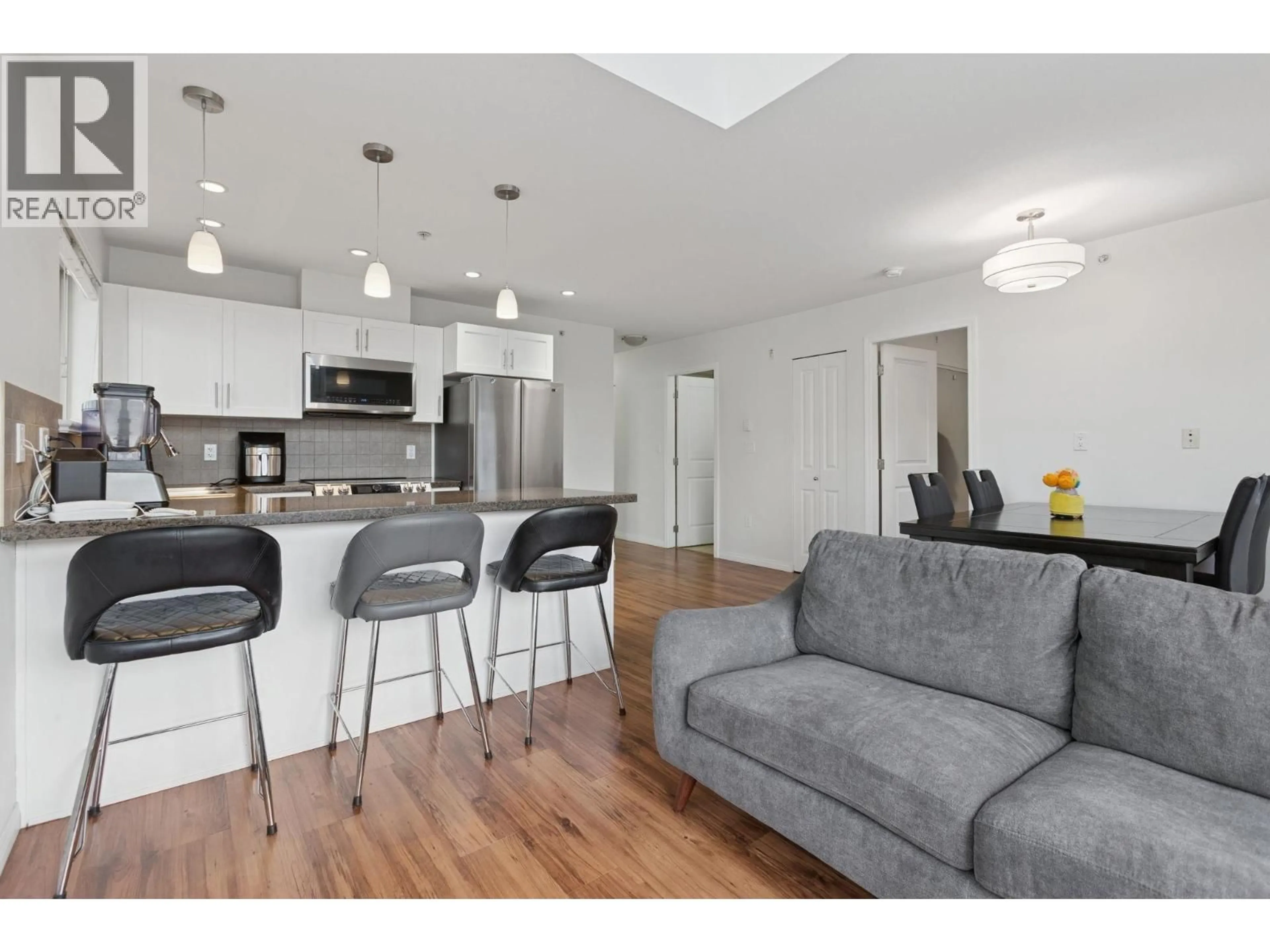 Open concept kitchen, wood/laminate floor for 301 - 5000 IMPERIAL STREET, Burnaby British Columbia V5J1C8