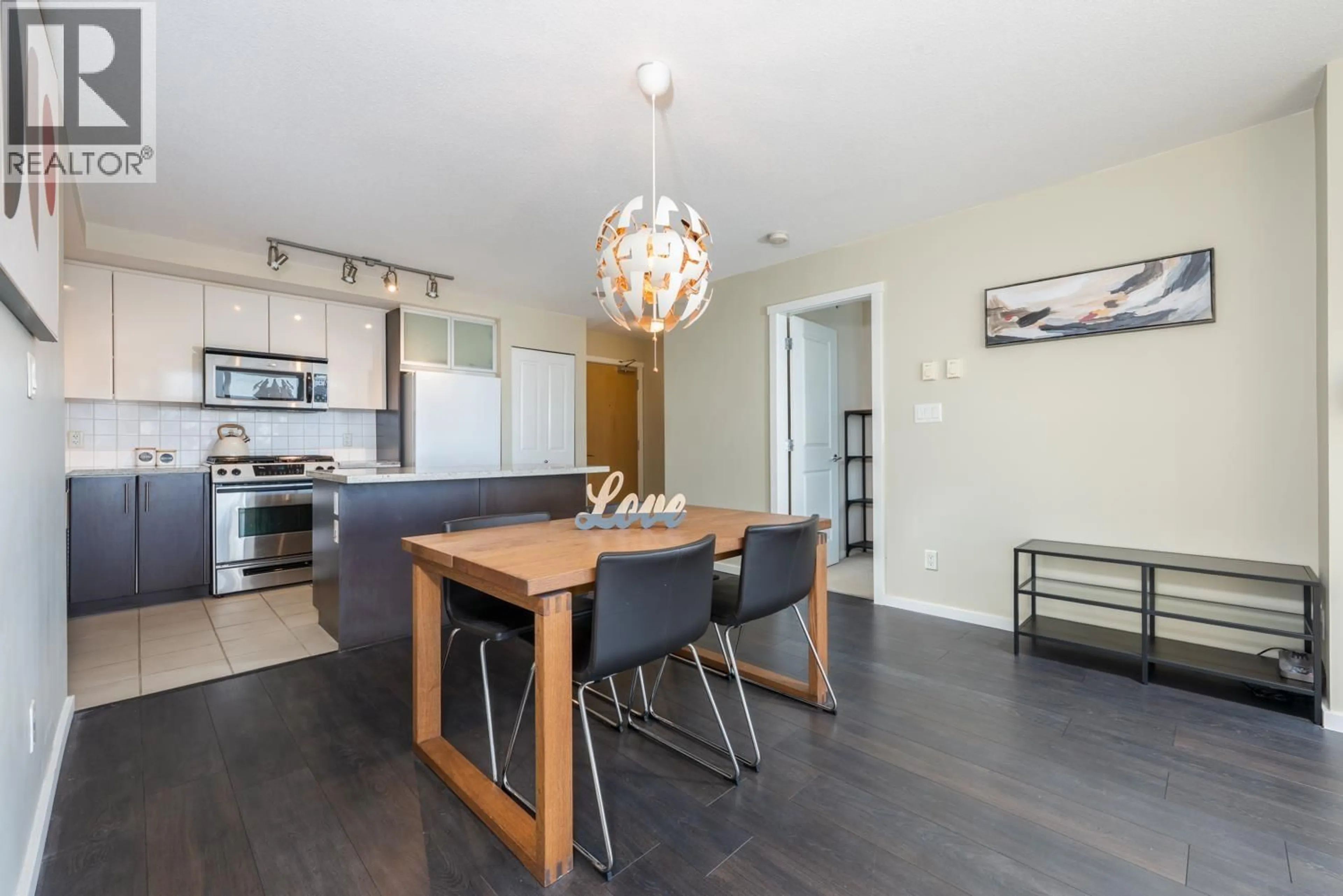 Open concept kitchen, wood/laminate floor for 2608 - 2289 YUKON CRESCENT, Burnaby British Columbia V5C0B2