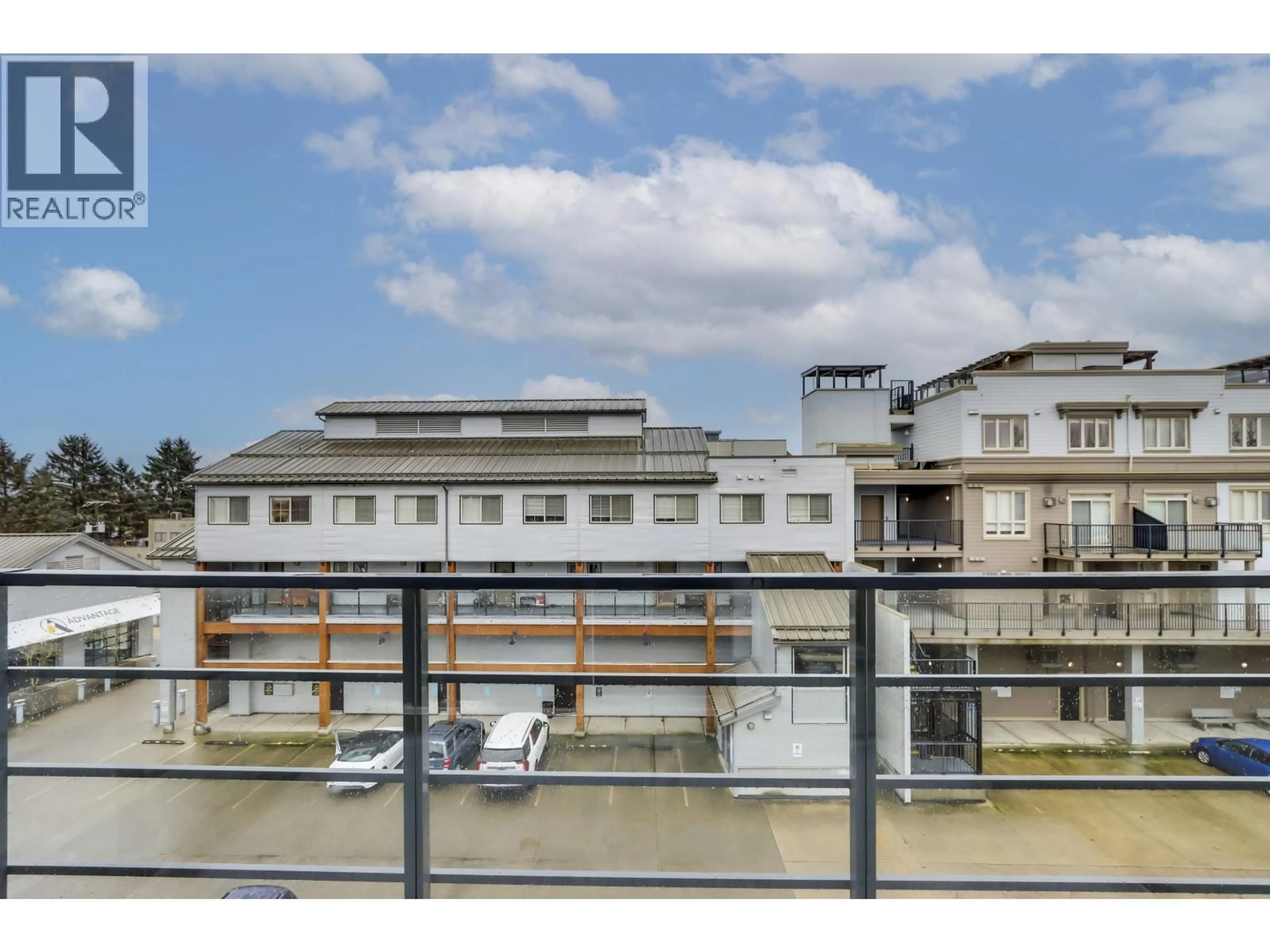 Balcony in the apartment, city buildings view from balcony for 411 - 13040 NO. 2 ROAD, Richmond British Columbia V7E0C4