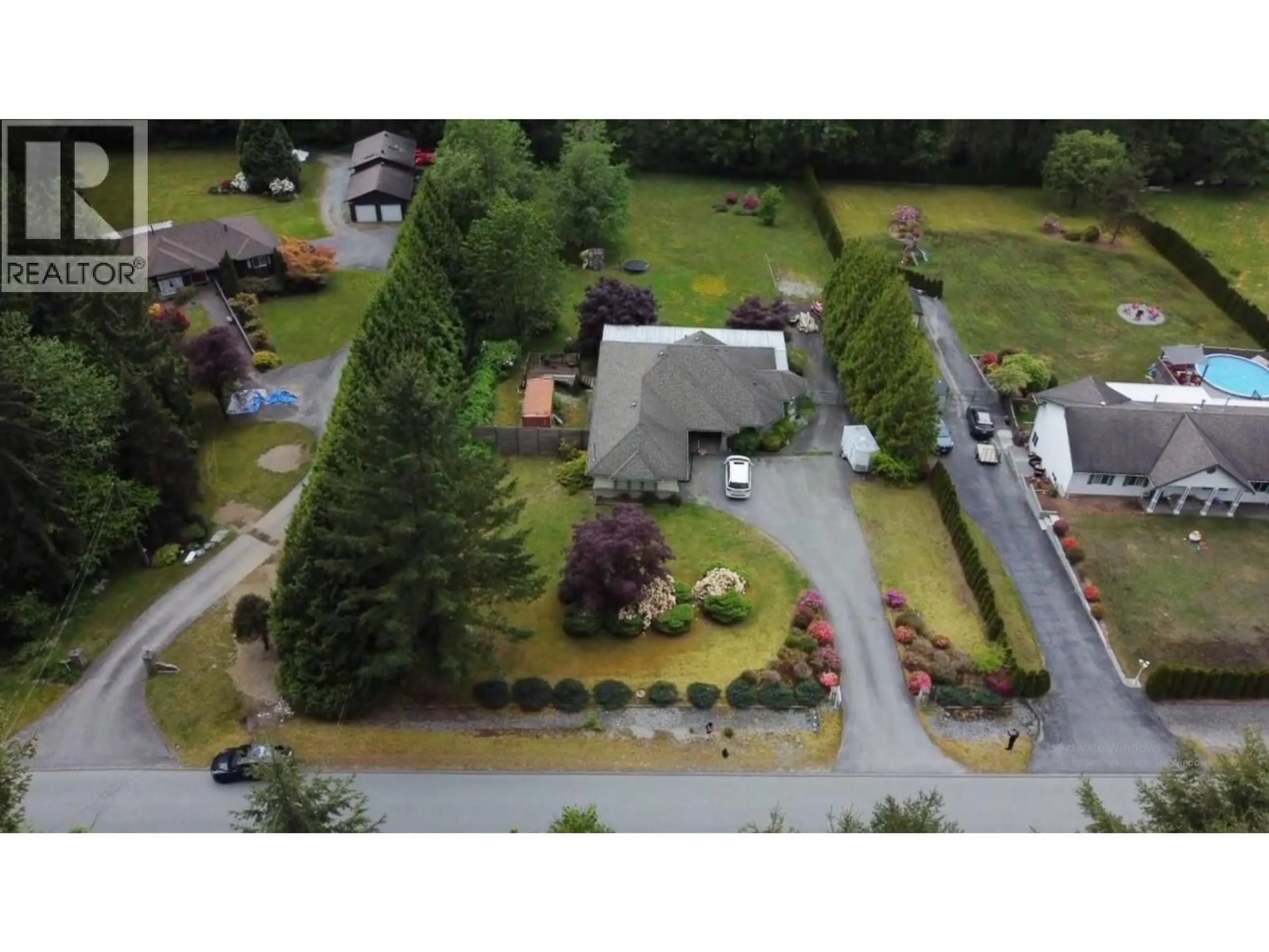 A pic from outside/outdoor area/front of a property/back of a property/a pic from drone, mountain view for 12753 261 STREET, Maple Ridge British Columbia V2W1C3
