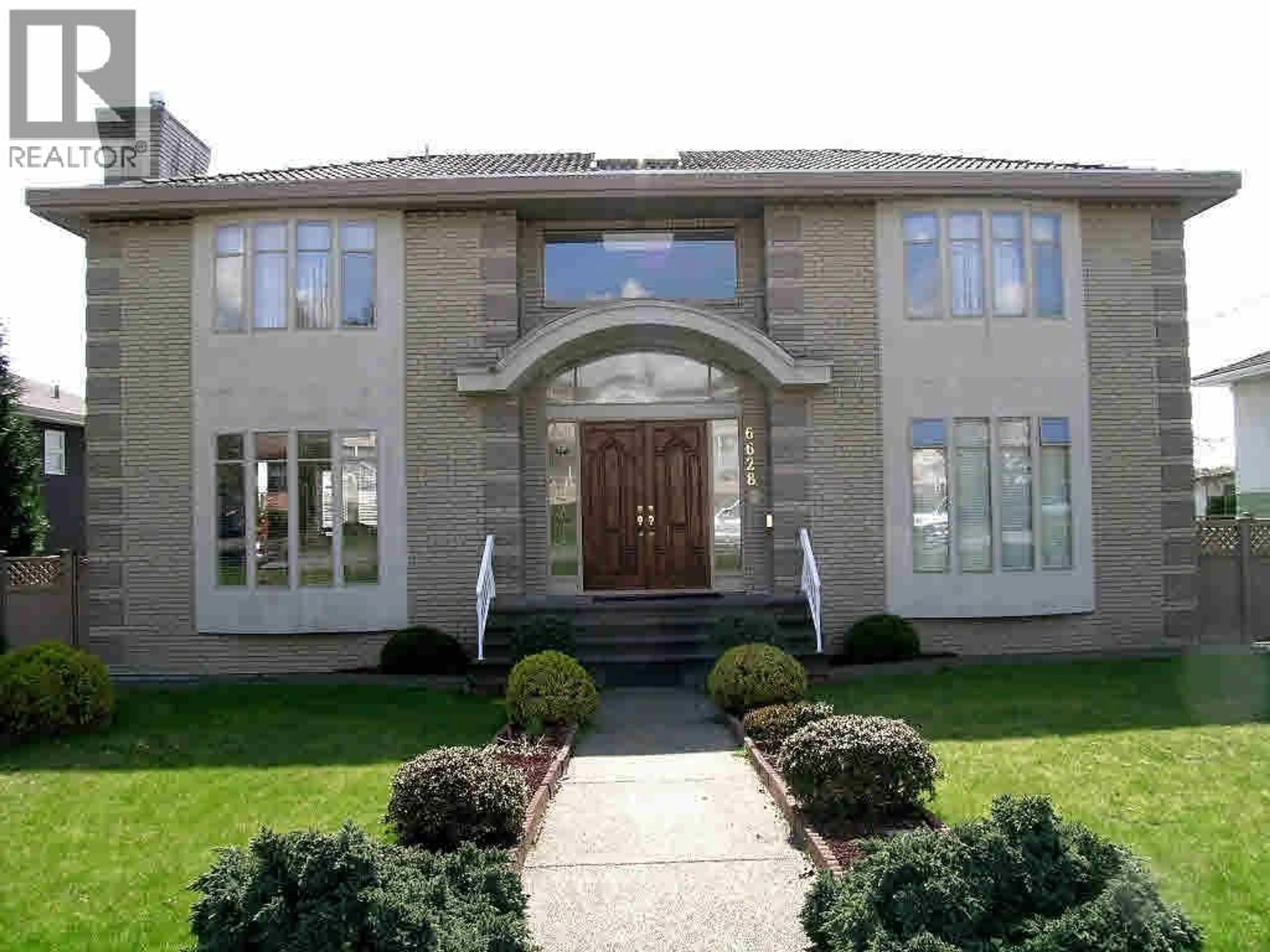 Home with brick exterior material, building for 6628 KITCHENER STREET, Burnaby British Columbia V5B2J6