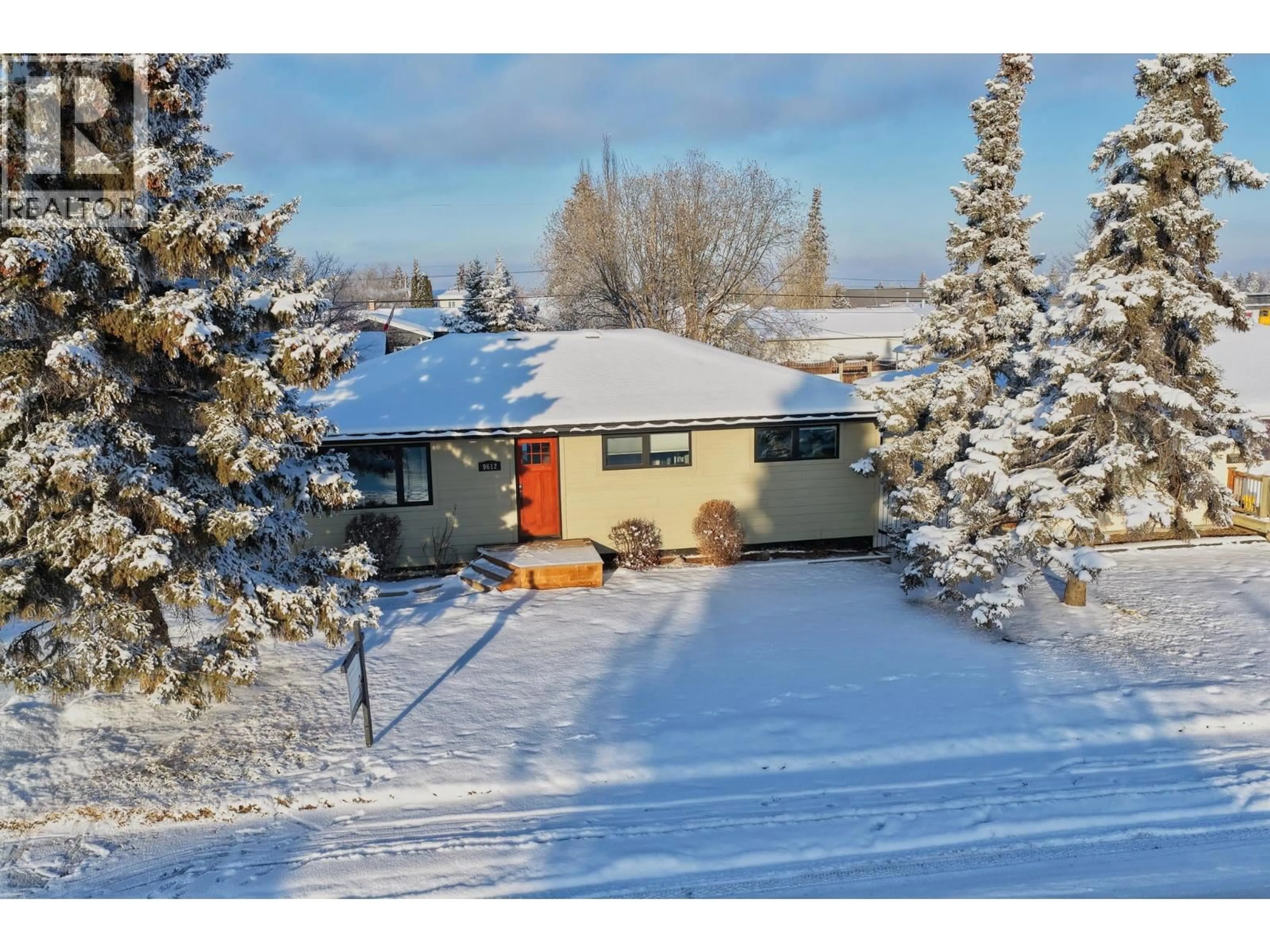 A pic from outside/outdoor area/front of a property/back of a property/a pic from drone, street for 9612 105 AVENUE, Fort St. John British Columbia V1J2M1