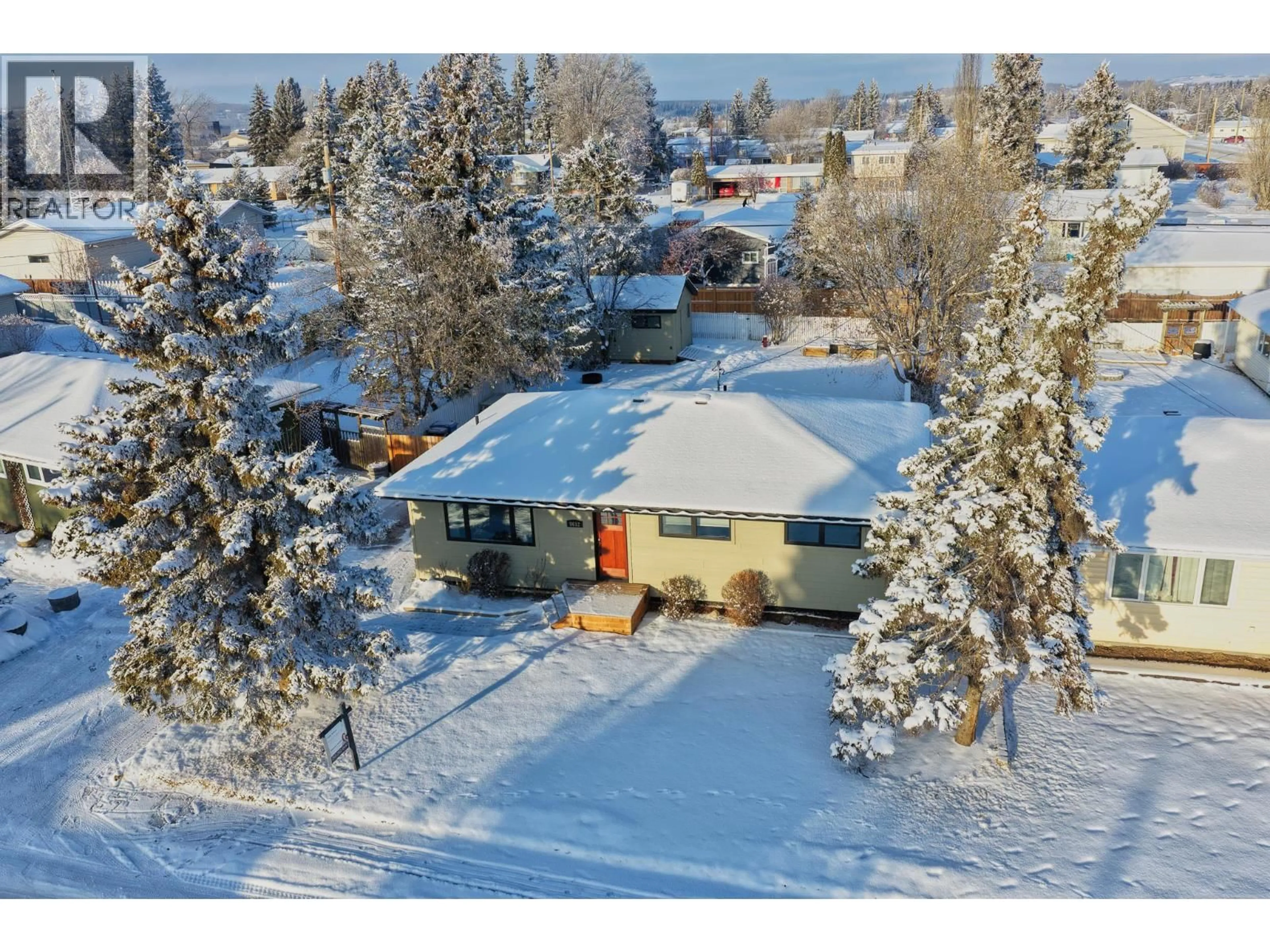 A pic from outside/outdoor area/front of a property/back of a property/a pic from drone, street for 9612 105 AVENUE, Fort St. John British Columbia V1J2M1