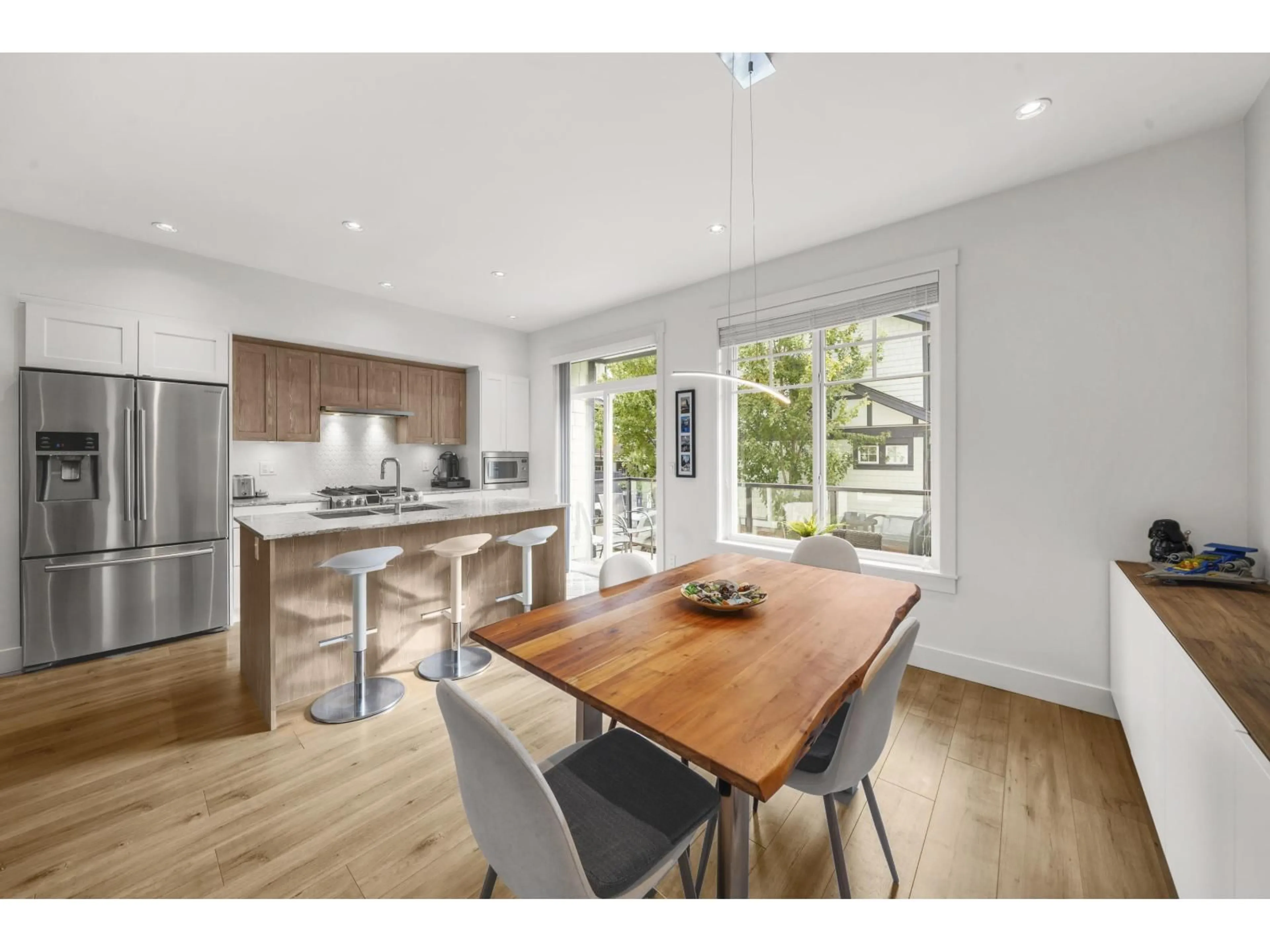 Open concept kitchen, wood/laminate floor for 22 - 11188 72 AVENUE, Delta British Columbia V4E0A5