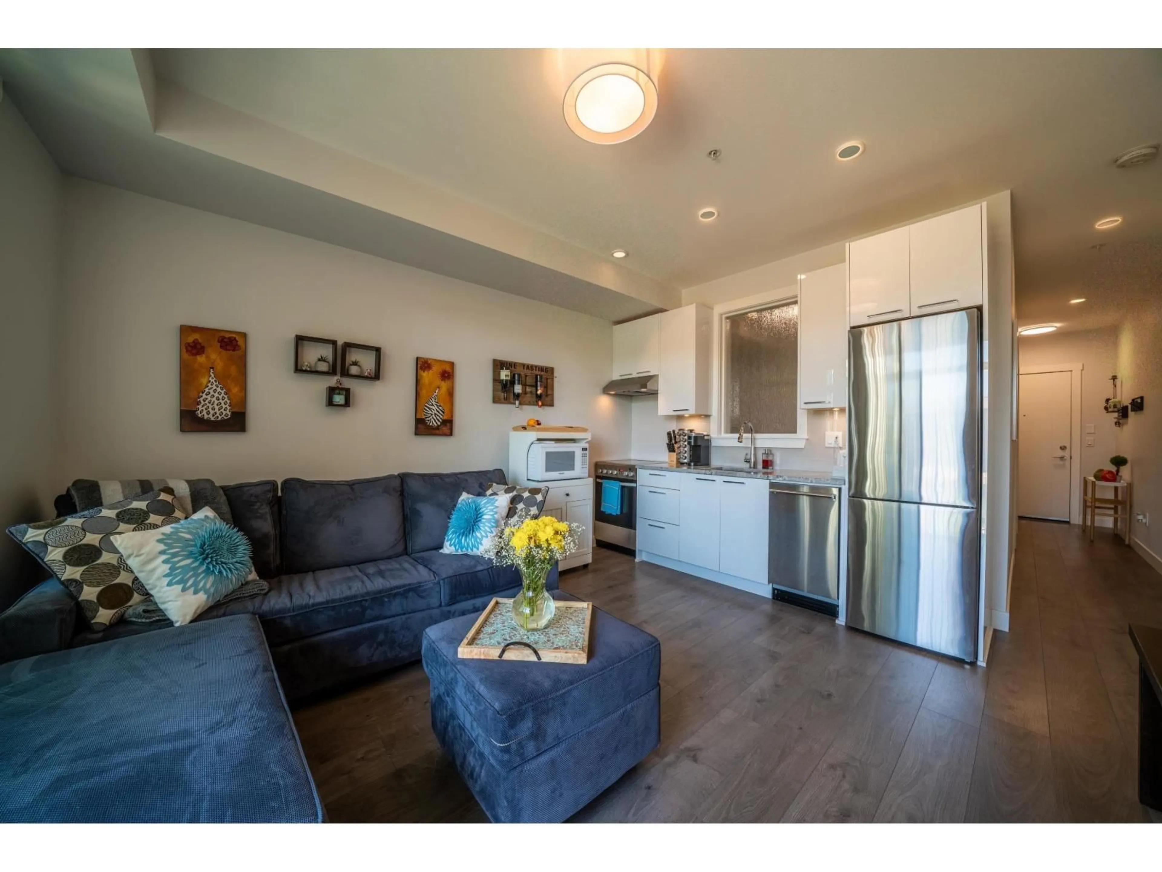 Open concept kitchen, wood/laminate floor for 206 - 20686 EASTLEIGH CRESCENT, Langley British Columbia V3A0M4