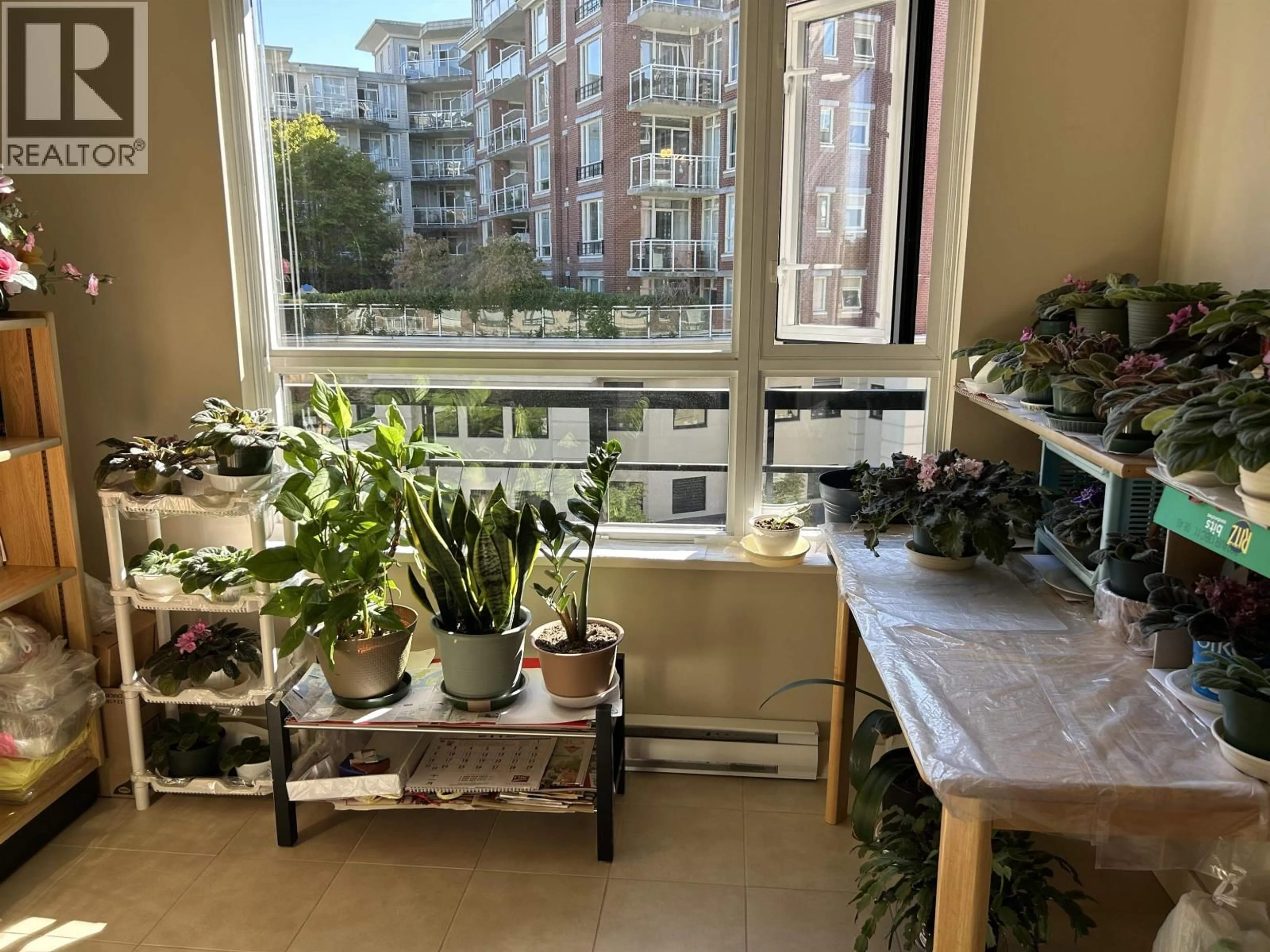 Balcony in the apartment, city buildings view from balcony for 418 - 4028 KNIGHT STREET, Vancouver British Columbia V5N5Y8