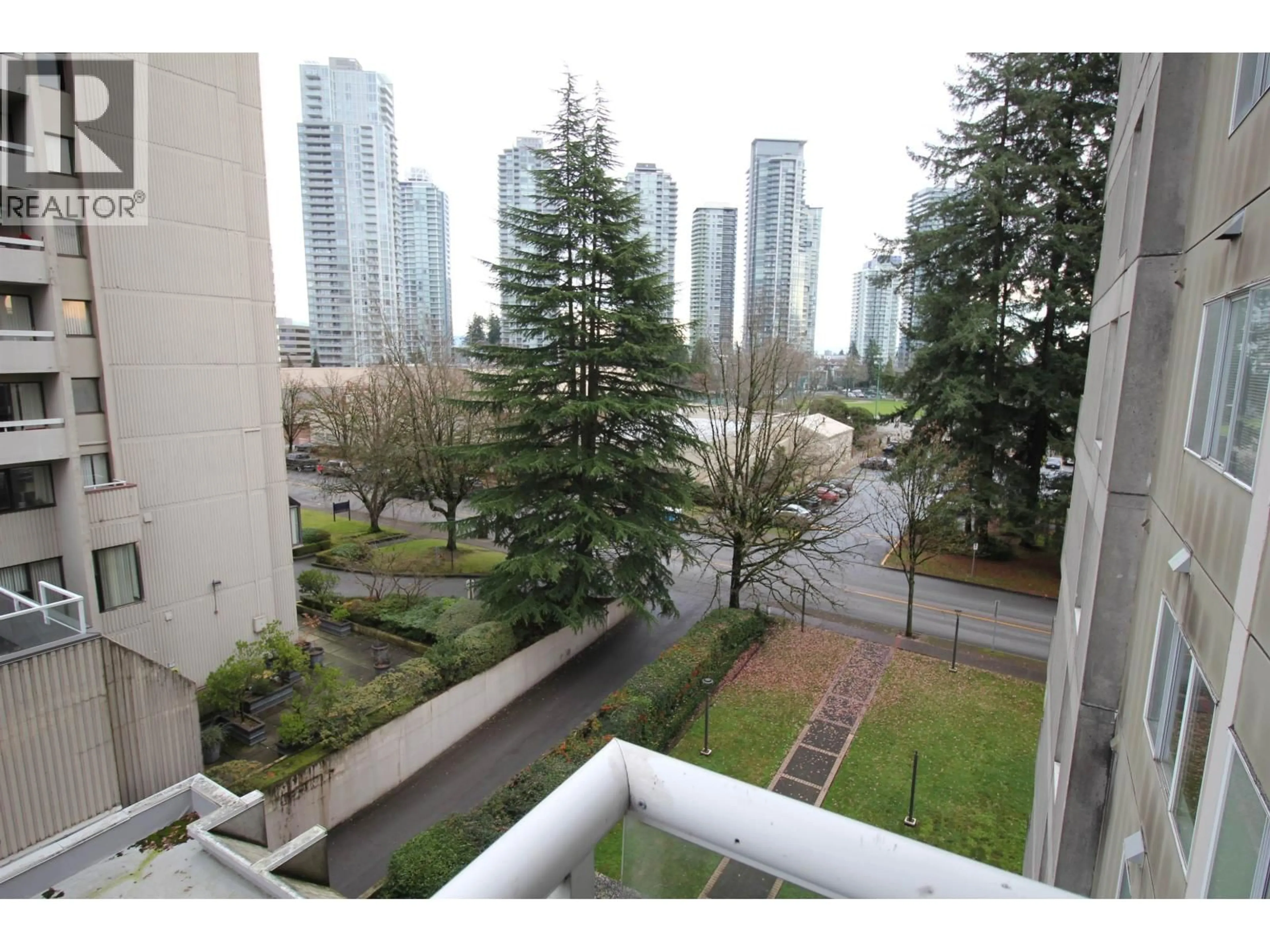 Patio, city buildings view from balcony for 706 - 6595 BONSOR AVENUE, Burnaby British Columbia V5H4G5