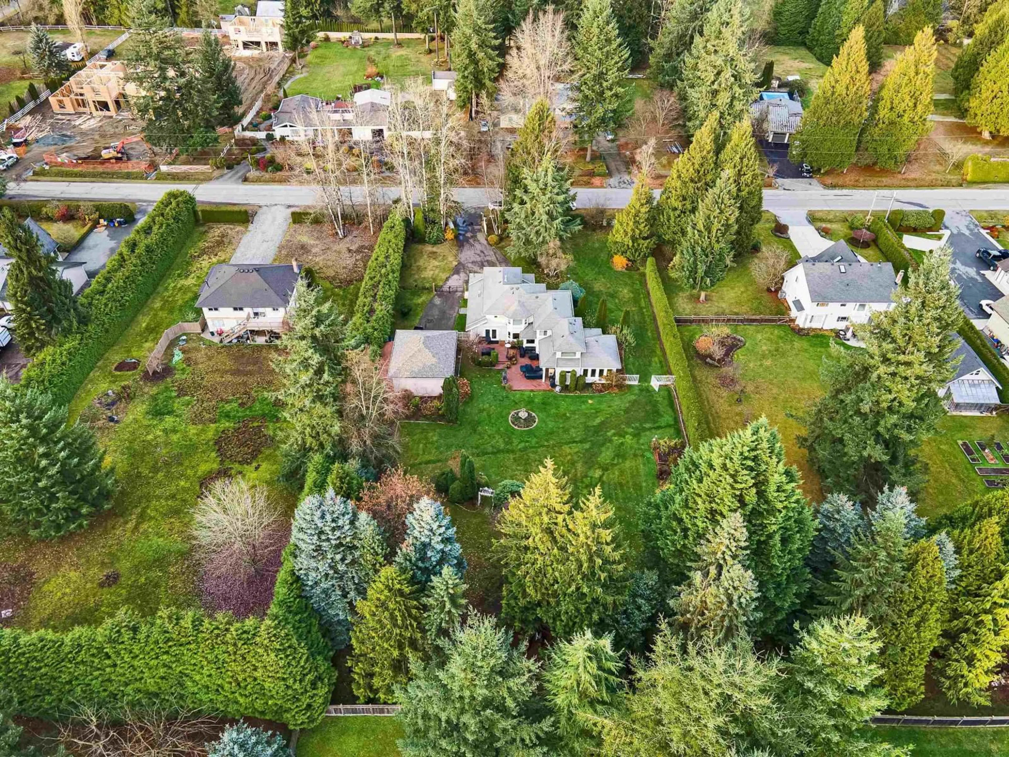 A pic from outside/outdoor area/front of a property/back of a property/a pic from drone, forest/trees view for 25072 58 AVENUE, Langley British Columbia V4W1T5