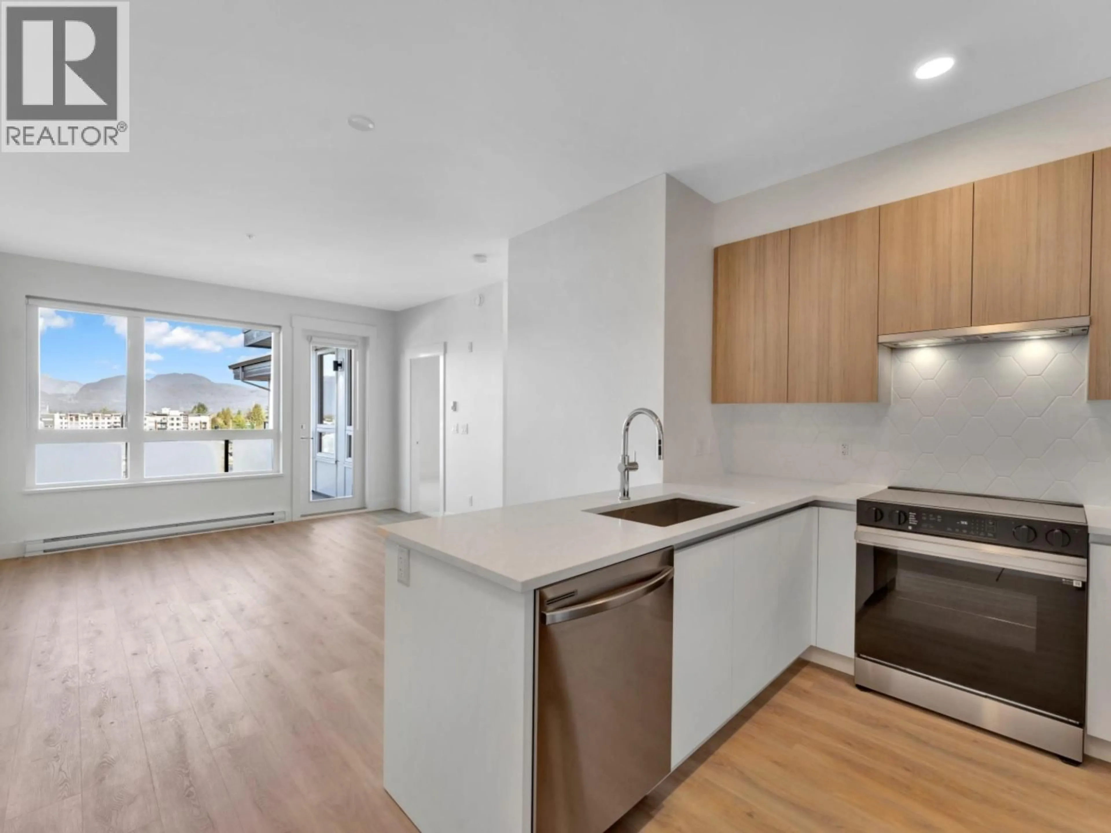 Open concept kitchen, unknown for 610 - 11907 223 STREET, Maple Ridge British Columbia V2X4P9