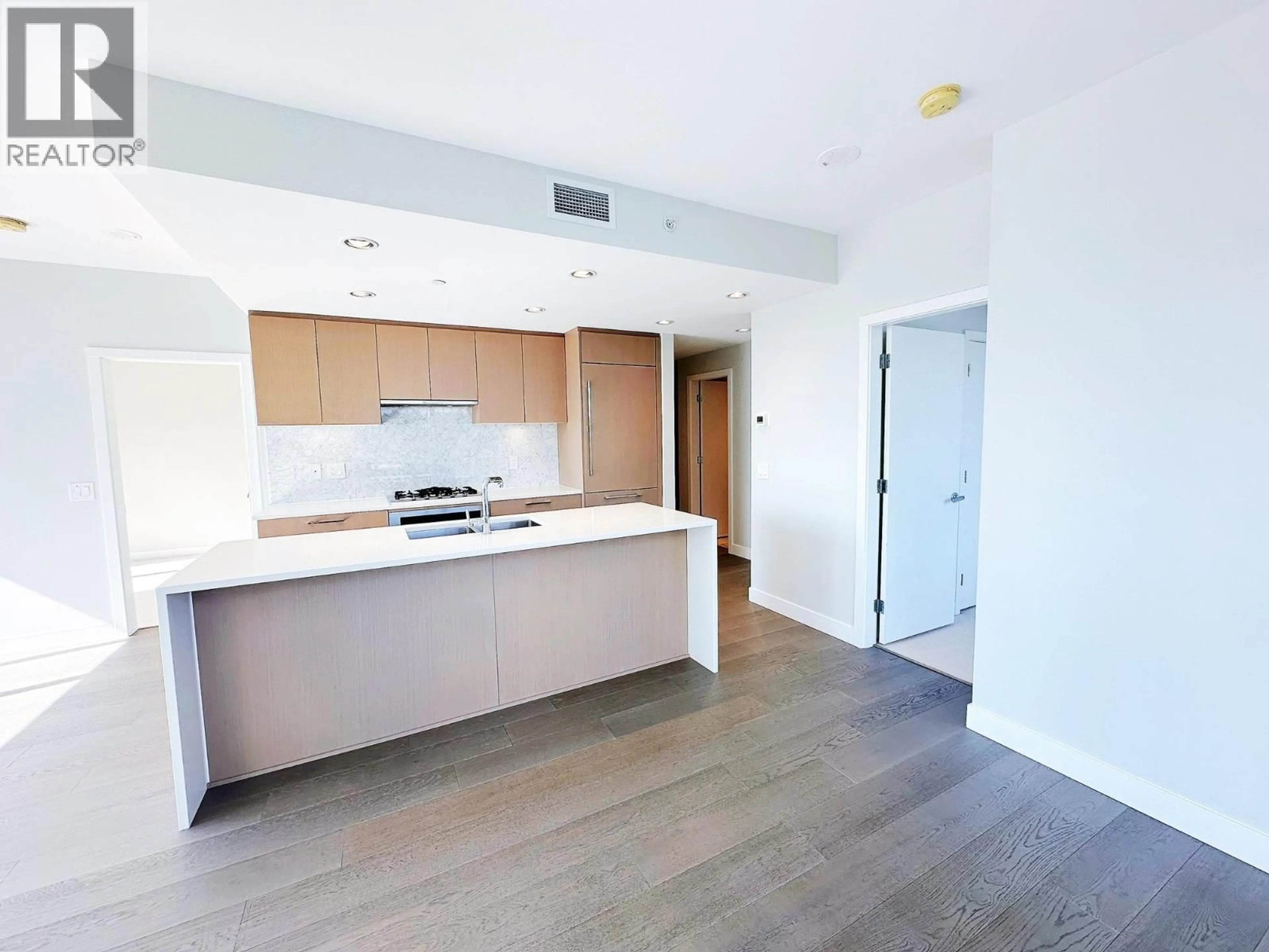 Open concept kitchen, unknown for 908 - 5410 SHORTCUT ROAD, Vancouver British Columbia V6T0C8
