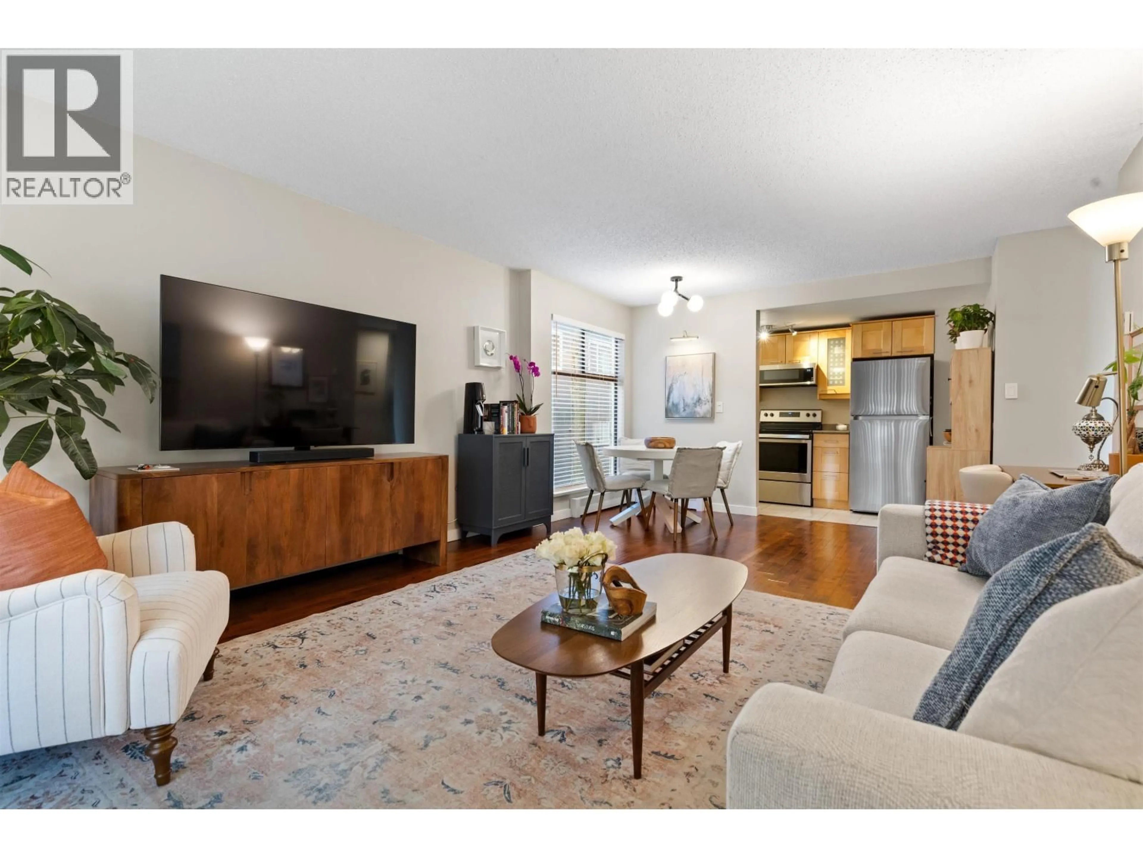 Living room with furniture, wood/laminate floor for 109 - 423 AGNES STREET, New Westminster British Columbia V3L1G2