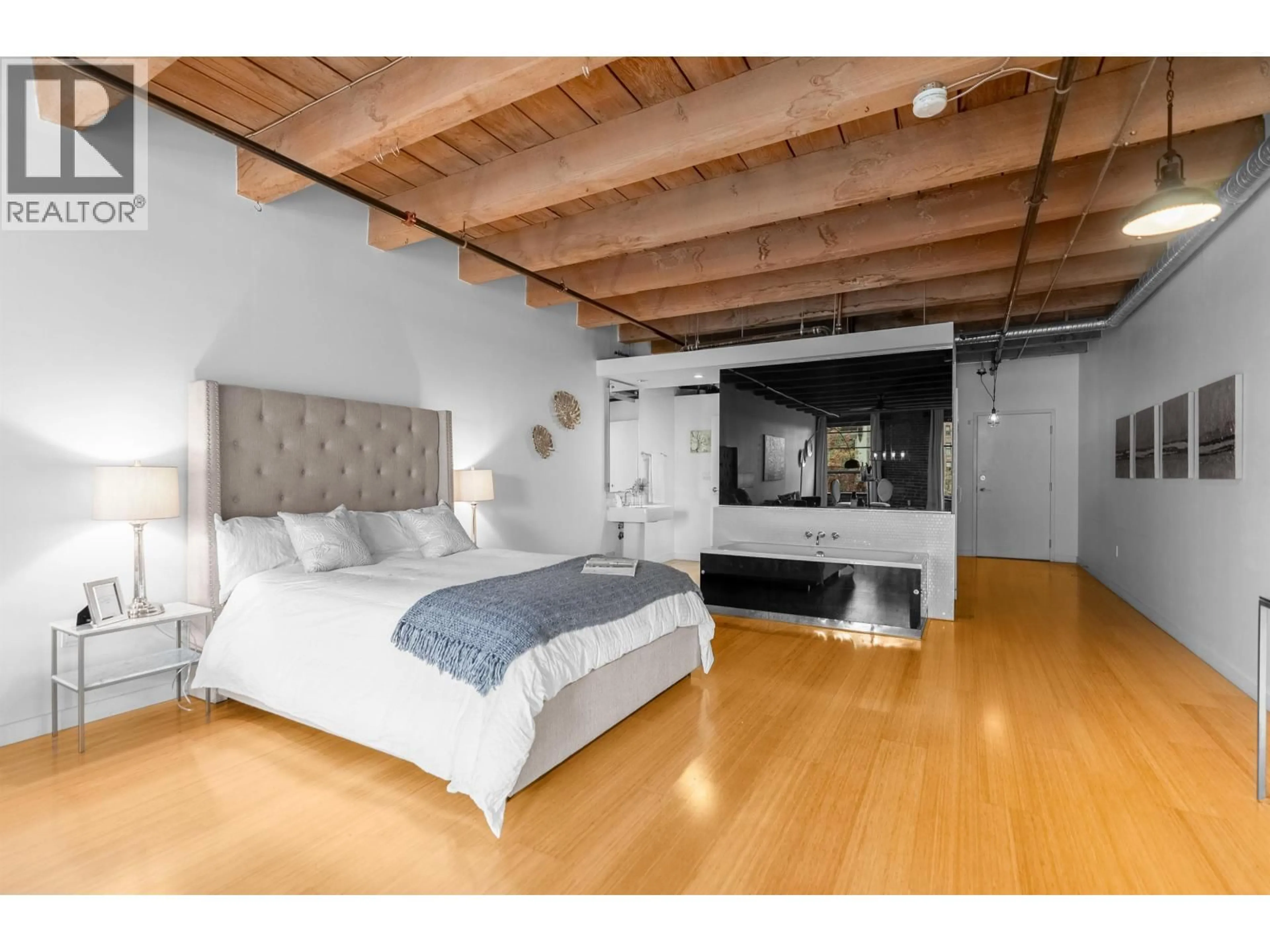 Bedroom with bed, wood/laminate floor for 315 - 55 CORDOVA STREET, Vancouver British Columbia V6A0A5