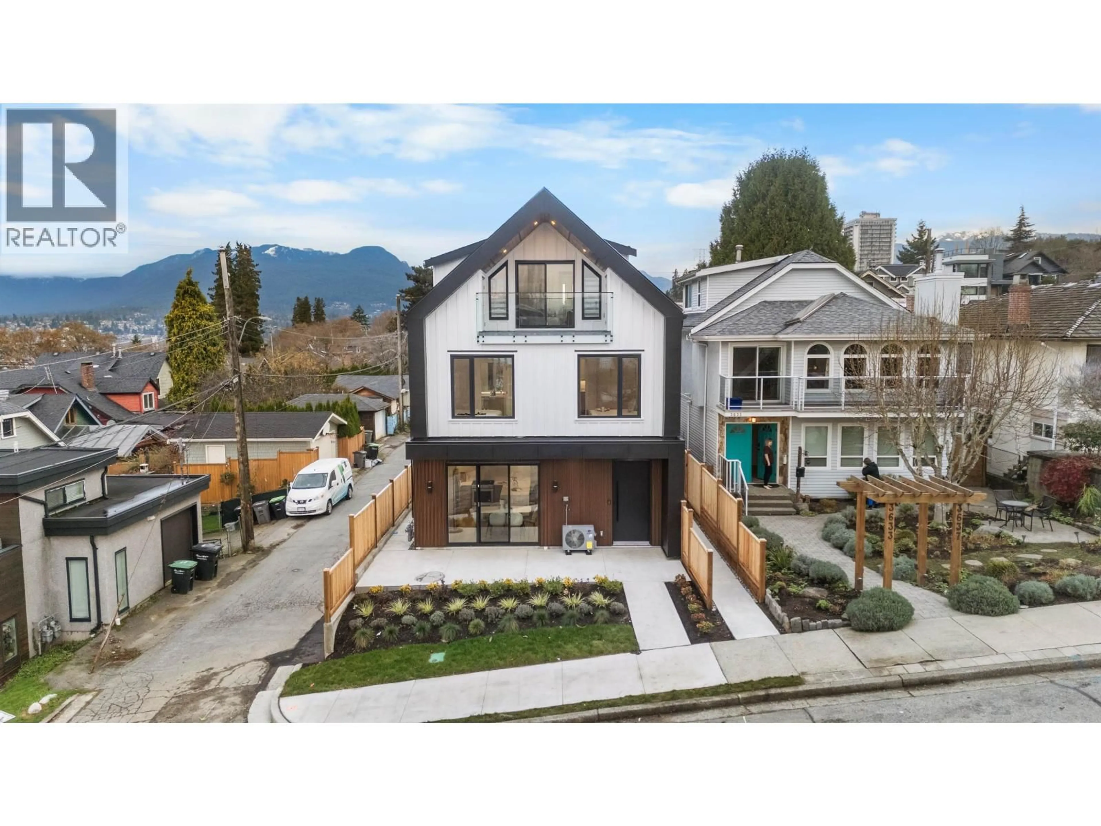 A pic from outside/outdoor area/front of a property/back of a property/a pic from drone, mountain view for 1 - 3623 TRIUMPH STREET, Vancouver British Columbia V5K1V4